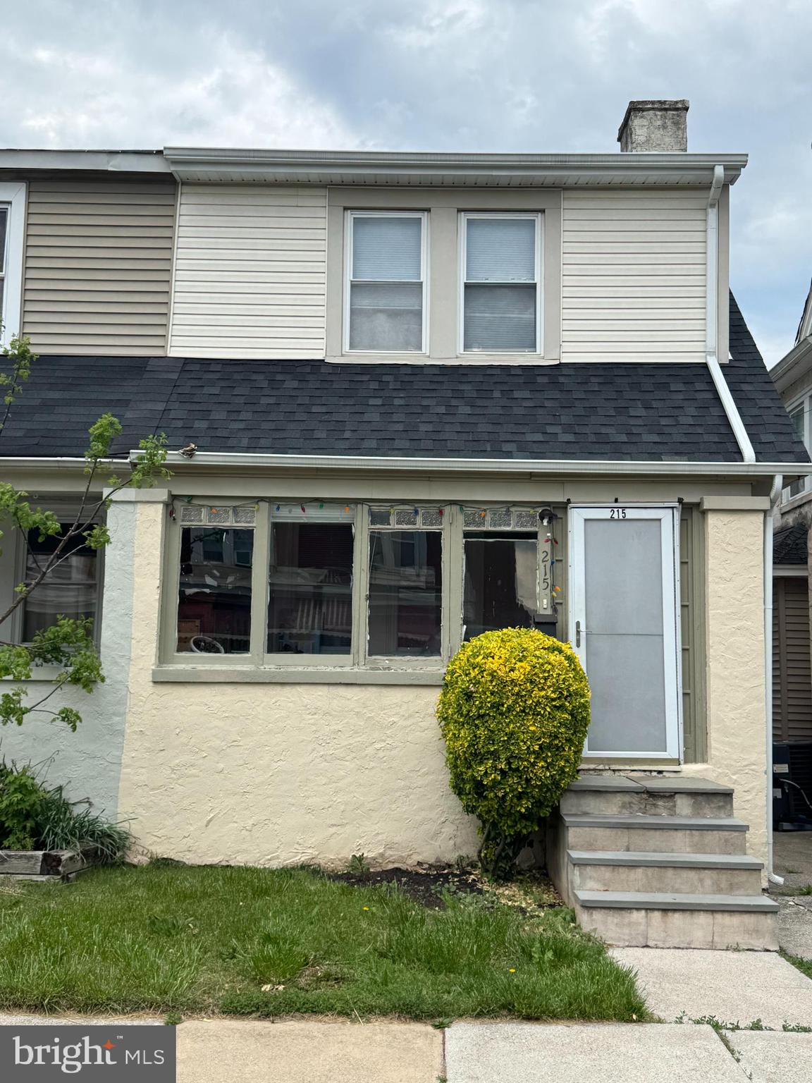This 3-bedroom twin home blends character with opportunity. As you approach, you’re welcomed by an enclosed front porch—unheated and without electric, but perfect for enjoying spring mornings or storing seasonal items. Step inside and you’ll find a cozy layout, highlighted by a non-functioning fireplace that still adds a touch of charm.
In the back, a small covered porch offers a peaceful spot to unwind, and just beyond it, there’s convenient off-street parking for two vehicles. The home sits atop a full unfinished basement, offering plenty of room for storage or potential workspace.
While the home currently uses electric heat, it remains plumbed for oil, giving the new owner flexibility for future upgrades. The roof was installed around 2023, providing peace of mind for years to come. With a long-term tenant already in place, this property presents an excellent opportunity for steady rental income or a future owner-occupant looking to make it their own.