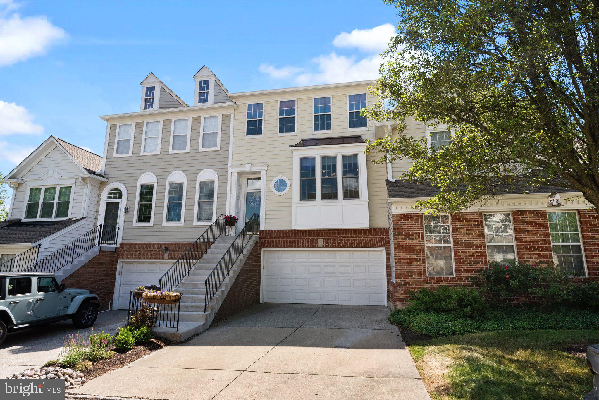 Impeccable Braddock Model in Doylestown Station – Backing to Wooded Privacy!
This beautifully maintained and spacious townhome offers an exceptional floor plan and ideal location in sought-after Doylestown Station. Backing to a serene wooded and tree-lined area, enjoy a rare sense of privacy while remaining just minutes from everything.
Featuring 3 Bedrooms, 2 Full Bathrooms, 2 Half-Bathrooms, a finished walk-out basement, and a 2-car garage, this home is loaded with updates and thoughtful amenities throughout. The entry foyer includes a transom window and guest closet, with rich hardwood flooring extending through the main living areas.
The updated kitchen is a standout with wood cabinetry, Quartz countertops, tiled backsplash, pantry, stainless steel appliances, and a peninsula with seating – perfect for casual dining or entertaining. A formal dining room boasts decorative moldings and chair rail, while the cozy living room features a gas fireplace, ceiling molding, and recessed lighting. Step outside to a rear deck overlooking the tranquil backyard.
Upstairs, the primary suite includes a tray ceiling, oversized windows, and a private en-suite bath with a large tiled shower. Two additional bedrooms offer generous closet space and share a well-appointed hall bath. Convenient second-floor laundry adds ease to daily living.
The finished walk-out lower level provides additional living space, garage access, and walk-out to the backyard. The 2-car garage includes extra storage, and the wide poured-concrete driveway adds to the home's functionality.
Enjoy walking distance to Kutz Elementary, Kids Castle, and community walking trails, with close proximity to downtown Doylestown’s shops, dining, and public transportation.
This home truly offers comfort, convenience, and style in one of the area’s most desirable communities!
