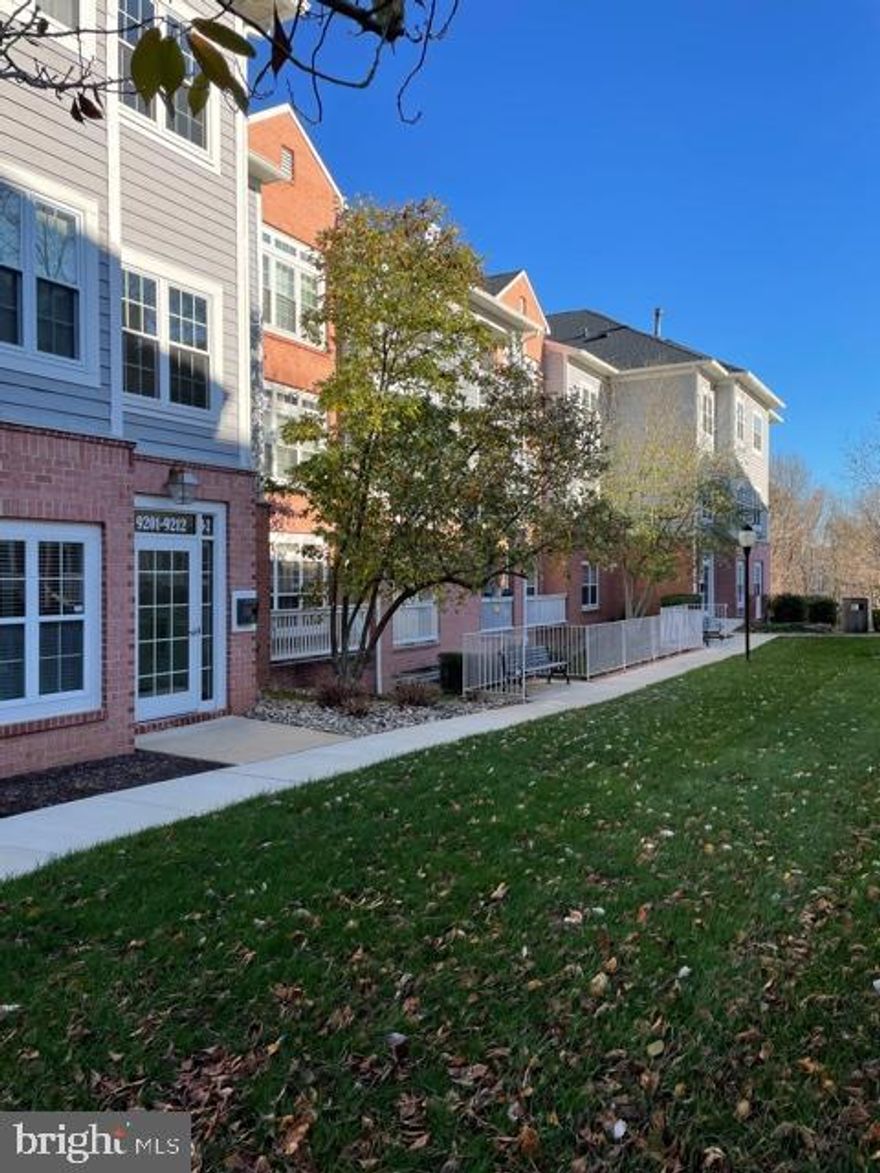 This rarely available three bedroom two bath condominium is perfectly situated in an elevator building in a gated community with a deeded underground garage parking space. This impeccable unit presents an  eat-in kitchen with newer  stainless steel appliances including a five burner gas range,  dishwasher, microwave, new laminate flooring, under cabinet lighting, and an over-sized breakfast room with park-like views. Also included is a spacious living room with door access to the patio, dining room  with tray ceiling, a master bedroom suite with double closets, en suite bath including tub and separate stall shower, and slider access to the covered patio. Additional updates include fresh paint, carpet  and lighting. The property also includes a stacked washer and dryer and ample storage. Community amenities include lighted tennis courts, swimming pool, walking and jogging paths, shopping and dining. With easy access to the Metro, Interstates 795 and 695, Foundry Row, and community activities, this move-in ready condominium affords convenience and inviting comfort.