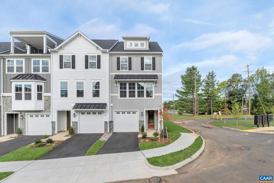 Welcome to the Grove at Brookhill, a quiet NEW neighborhood nestled in the woods with all the conveniences of Route 29 North in Charlottesville. The under construction Holly townhome is an effortlessly open plan with a spacious galley kitchen and rear, maintenance-free deck - perfect for an evening of entertaining friends and family. The attached 1-car provides easy parking and extra storage space.  First floor includes bedroom and full bathroom. The Grove at Brookhill will offer parks, walking trails, mountain views, shopping, dining, tennis courts, gyms, and more. Estimated Dec 2023 completion. Reserve your favorite homesite today! Similar photos.,Granite Counter,Maple Cabinets,Painted Cabinets,White Cabinets