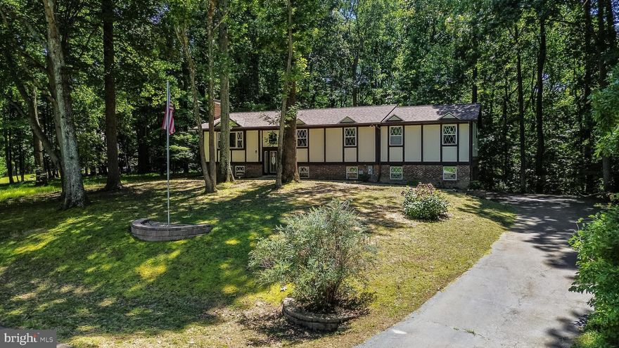 Home was just recently appraised WELL above asking price, so move in with instant equity! 

Nestled on a generous 3.12-acre lot, this spacious 5-bedroom, 4-bathroom home offers privacy in a serene cul-de-sac setting, all while being conveniently located near some of the blue ribbon schools in the area. Enjoy the peace of mind with NO HOA restrictions and the independence of having your own water well and septic system. Moreover, your only utility bill is for electricity, which is significantly reduced thanks to the state-of-the-art geothermal cooling and heating system that powers the house. This top-tier system, complemented by a brand-new x-large geothermal water heater, represents a $50,000 investment in energy efficiency and comfort. Plus, the geothermal system comes with a 5-year labor warranty from the date of install (2022) and a 10-year warranty on all parts from ClimateMaster.
 
The indoor environment is enhanced with a whole-house humidifier and a cutting-edge air scrubber equipped with UV light to effectively kill bacteria, ensuring clean and healthy air throughout.
 
Recently, the home has seen major upgrades. A fresh roof installation valued at $16,000 ensures durability and protection for years to come. The kitchen gleams with newly installed appliances, adding over $10,000 in value. The nearly new carpeting, only two years old, gives the home a warm and cozy feel. For added convenience, the residence features dual washer and dryer sets on both the upper and lower levels.
 
The main suite is a true sanctuary, boasting a spacious walk-in closet and a jacuzzi tub in the ensuite bathroom. Entertaining is a breeze with the basement's pool and table tennis facilities, and the expansive sunroom is perfect for hosting gatherings. Safety and accessibility are paramount, with most rooms being located on the top floor — ideal for families with children. Plus, every room offers direct access to the beautifully renovated deck, extending your living space outdoors. With fireplaces gracing both floors and a two-car garage equipped with brand-new door mechanisms, this home truly has it all.