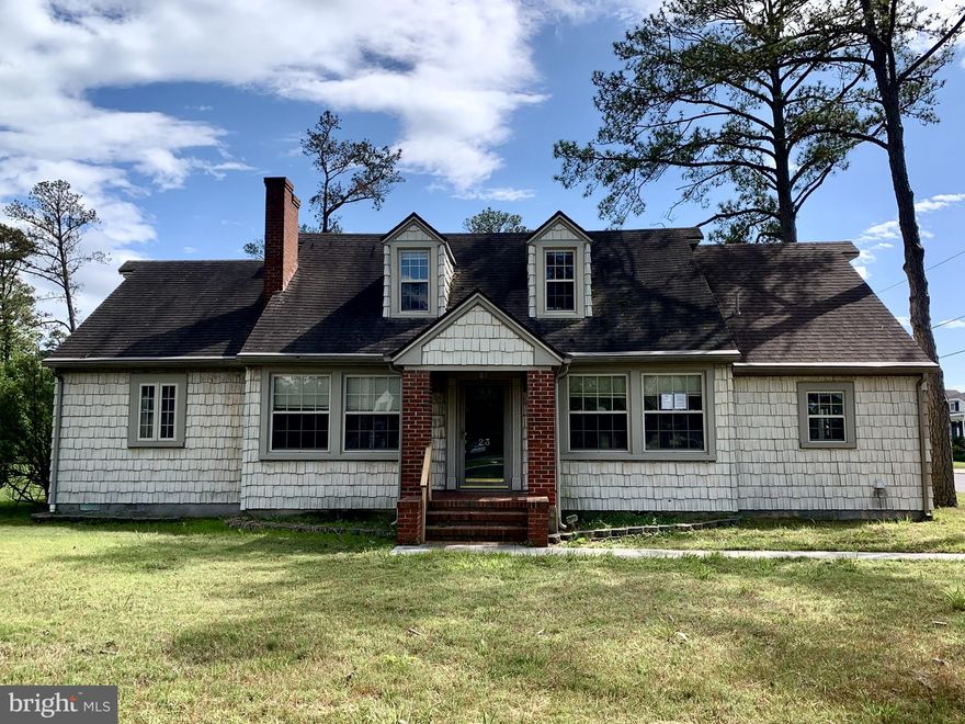 Welcome to the "Crab Capital of the World"! Eastern Shore living in this Classic Cape Cod with 4 bedrooms, 1 full bedroom and 1 half bathroom, a woodstove in the living room and a fireplace in the family room. 1-car attached garage on a 0.65 +/- acre corner parcel.  HUD Case #241-912882. Equal Housing Opportunity.