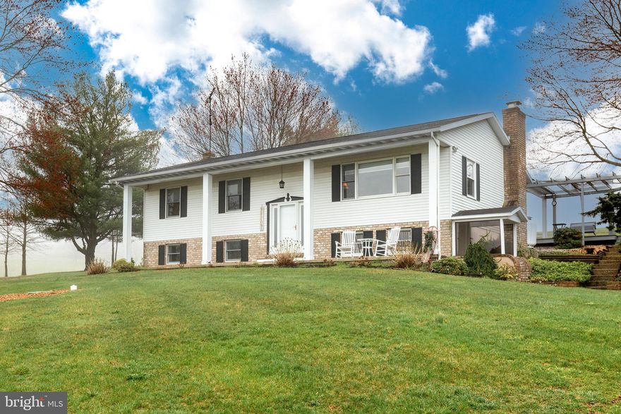 Sitting on 3.3 acres, Stunning 4 Bedroom / 3 Full Bath with a breath-taking country-side view. Single owner * No Pets * Never Smoked in *  Finished basement with a Bedroom, Full Bath, Wet Bar, designated laundry room, Propane log set and walk out. Upper level consists of 3 large bedrooms, master with full bath, living room and Massive eat-in kitchen.  Oversized rear deck with endless entertainment and evening sunsets.

New Septic System Fall of 2023