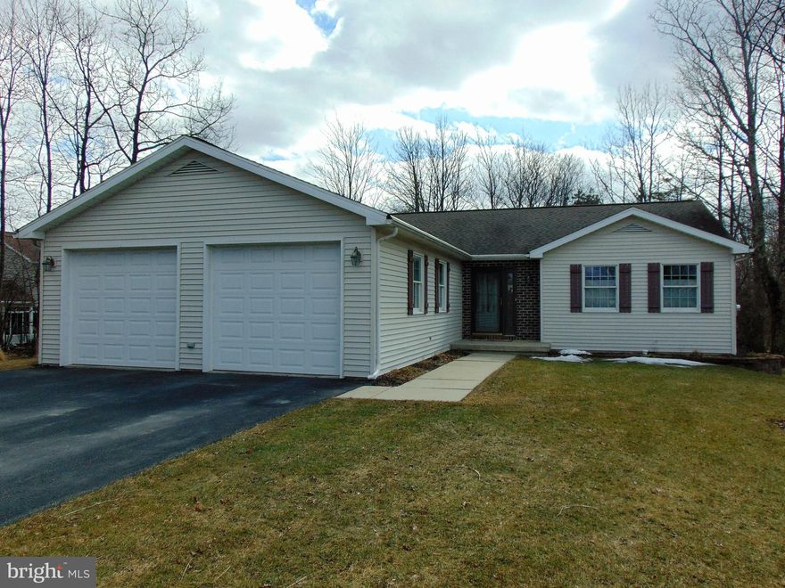 This 3 bedroom, 2 bath home was built by the current owners and they have paid absolute attention to detail throughout the home!  30 handle kitchen with professional grade appliances and walk in pantry.  Great open floor plan with cathedral ceiling in the great room and dining area.  Propane peninsula fireplace in great room.   Radiant heat in all of the flooring.  Solid wood doors, extended width doorways, 2 walk in showers and soaking tub.  Hardwired security, fire, smoke and CO2 system. Hot water return loop on the house.  Full unfinished basement with exterior entrance, rough plumbing for bathroom and 2 sump pumps.  Portable generator connection.  Heated garage.  Multi tiered composite deck and much more.