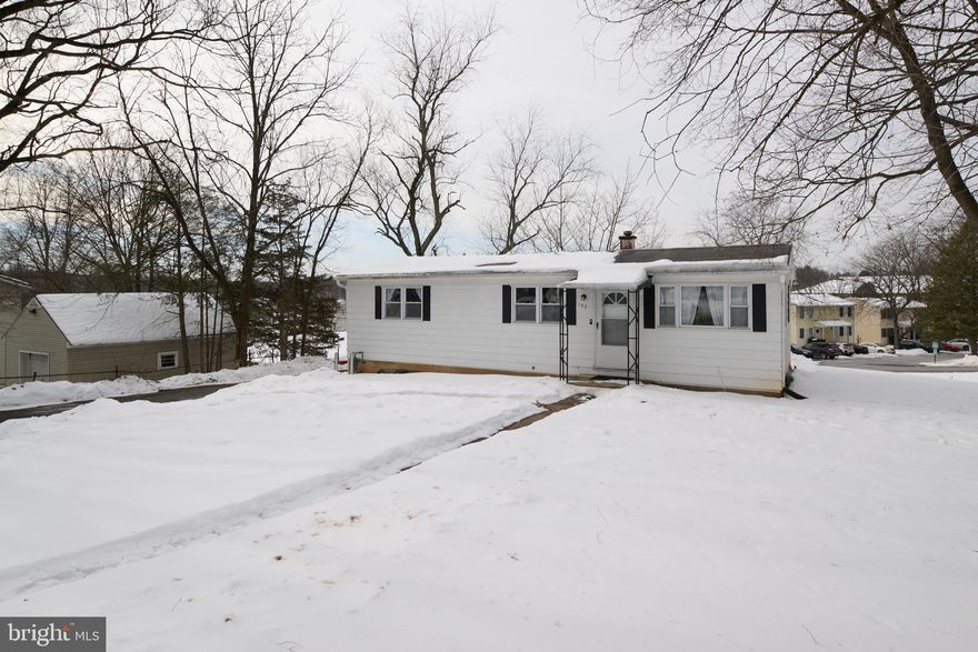 This ranch-style home offers a flexible ownership opportunity in the State College market. The property is located on a 0.24-acre lot and features two bedrooms and one full bathroom on the main level. The interior includes updated flooring, neutral finishes, and a functional kitchen with painted cabinetry and laminate countertops. A walk-out basement provides additional utility and includes a partially finished bonus room, along with unfinished space for storage, laundry, and mechanical systems. Exterior improvements include a detached one-car garage and usable rear yard. The property has an active rental permit, and zoning allows for potential occupancy by up to three unrelated individuals (including students). The location offers convenient access to the Penn State campus, downtown State College, shopping, parks, and major commuter routes.