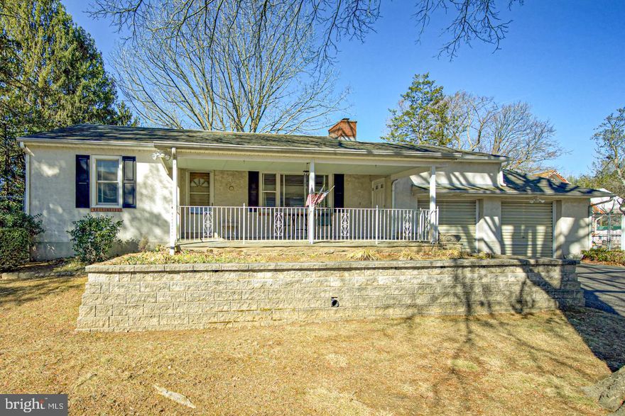 A really quaint house situated on a level 1/2 acre lot with an oversized 2 car garage and finished basement. This home has been lovingly maintained by it's original owners. The exterior of the home is stucco over block which is super solid construction. Living room with stone fireplace, kitchen, mudroom with an outside entrance to the rear yard, sunroom with another outside entrance. Two nicely sized bedrooms and ceramic tile hall bath. Finished basement with newer Weil McLain boiler and powder room. Cedar closet, whole house alarm with fire and security. Covered front porch and fenced rear yard. The location is perfect!