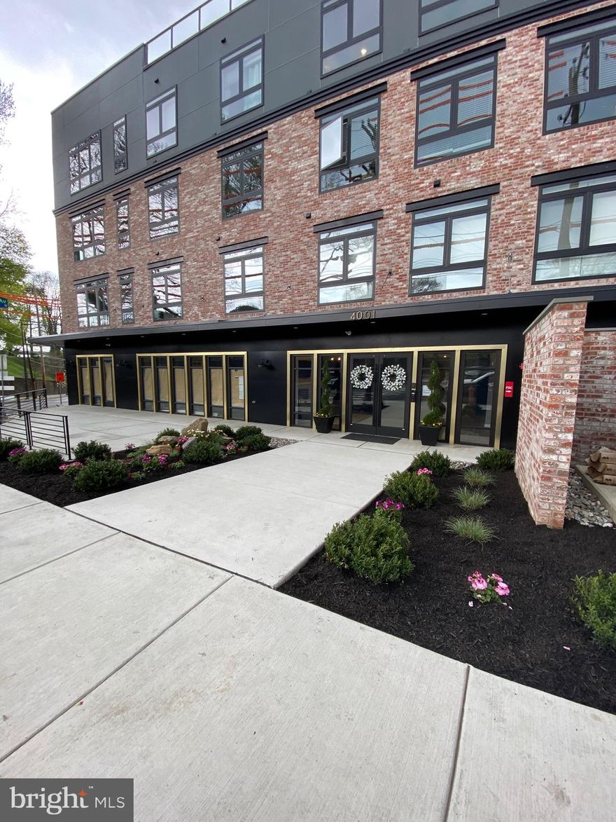 East Falls right by Kelly Drive…Luxury Loft with a roof deck, sauna, gym, pool table , shuffle board
We have a dog park!!
Boutique living at its finest with optional garage parking! This high end building features great natural sunlight has option for off street garage parking, right off of Scenic Kelly Drive, lots of extra space throughout the common areas.  Enter in through the inviting lobby which has custom trim work throughout, fireplace with accent wall, island/bar area to hang out and watch tv and or sit and wait to catch your uber &  lyft.  Amazon, Fed Ex, and deliveries can drop your packages in your very own personal & gorgeous package room cubby. Gorgeous Kitchens with an island, quartz countertops, soft close drawers, backsplash, stainless steel package with ice/water maker fridge, pantries, high ceilings, recessed lighting, nice wood like floors, very large bedrooms (bedroom can fit a king size bed, couch, and a desk), bathroom with heated floor.    If you need a place to retreat and rejuvenate yourself there is a 24- hour gym and sauna!  For all of our pet lovers, there is very own dog washing station that you have access so you don't have to wash your dog in your flat.   Features: 24 hour gym (Treadmills, elliptical, free weights, and weight machines) Flat Screen TV's with SPORT Package Sauna Community Kitchen Free Wifi in community areas Gated garage (see about availability and cost) Key fob entry Lobby area Key fob Package room (individual cubbies) Commercial Fridge for Grocery delivery Roof deck with view of the city (outdoor tv) kitchen station on deck Full front loader washer and dryer in each unit LOW utilities, Central air ,Security alarms ,Gorgeous kitchens, High ceilings, recessed lighting, Garbage disposal Full size fridge with ice maker, Elevator, Pets allowed (see property manager for details) Community Room.