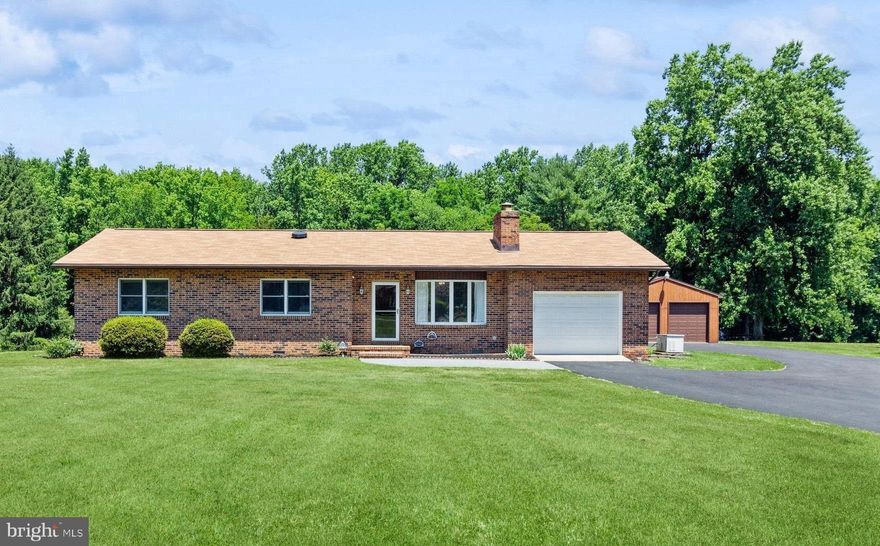 Welcome to your new home in the serene setting of Havre de Grace! This beautifully updated rancher, situated on a sprawling 3.8-acre lot, offers the best of one-level living with modern conveniences and ample space for all your needs.

Step inside to find a bright and welcoming interior, freshly painted and featuring brand-new carpeting throughout. The heart of this home is the spacious living area, perfect for family gatherings or quiet evenings. The kitchen boasts new appliances, ensuring your culinary adventures are a breeze.

This home offers three comfortable bedrooms and 1.5 well-appointed bathrooms, providing ample space for family and guests. The primary suite is a peaceful retreat, with plenty of natural light and closet space.

Car enthusiasts and hobbyists will appreciate the attached one-car garage, as well as the impressive detached garage measuring 23x26'. This additional garage features two doors, each 9 feet high, providing plenty of room for larger vehicles, a workshop, or extra storage. Plus, there's an additional storage shed for all your gardening tools and outdoor equipment.

The property is designed for convenience and accessibility, with an asphalt driveway that can accommodate up to 10 cars, perfect for entertaining or hosting gatherings. The expansive 3.8-acre lot offers endless possibilities for outdoor activities, gardening, or simply enjoying the tranquility of your own private oasis.

Located in the charming community of Havre de Grace, this home combines the peace of rural living with the convenience of nearby amenities. Don't miss the opportunity to make this stunning rancher your own!

Roof - Less than 3 years old
HVAC - About 10 years old
HWH- Replace in 2023
Propane Tank- Owned and powers the generator and fireplace
Generator - Runs on propane. 
Windows - Most have been replaced, but we're not sure when
Driveway - Resealed in 2023