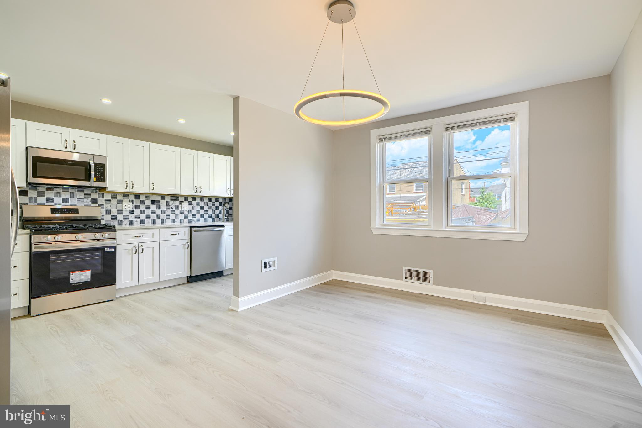 Wake up every morning, and say, I can’t believe I live in this amazing home! Gorgeous kitchen with quartz countertop, coordinating backsplash, wood shaker cabinets, and stainless steel appliances. Upstairs bath is elegant and comfortable, with custom tilework and designer plumbing and lighting fixtures. Full basement suite includes family room, bedroom with closet, full bathroom with custom tile shower, and laundry area. This home features coordinated lighting and plumbing fixtures, replacement windows, recessed lighting, HVAC system, Luxury vinyl plank flooring, concrete driveway and deck in rear, front porch