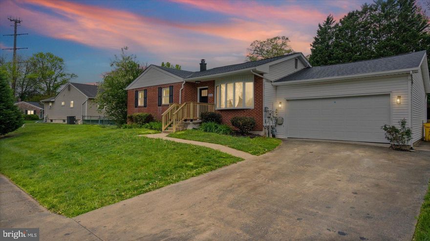 Beautifully renovated rancher featuring a bright, open floor plan and modern finishes throughout. The main level includes a gourmet kitchen with a center island, stainless steel appliances, and three bedrooms with two full baths. The huge, fully finished lower level offers a spacious recreation room and a third full bath, providing plenty of extra living space. Exterior features include a level backyard with a storage shed and a large two-car attached garage. Move-in ready and perfectly designed for comfort.