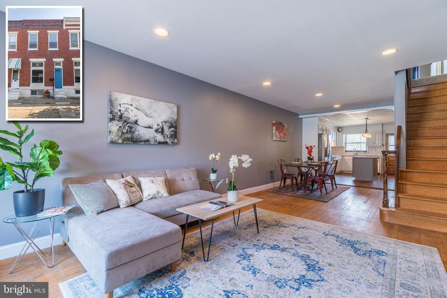 PICTURE PERFECT CANTON ROWHOME WITH 3 FINISHED LEVELS AND PARKING!  Over 1,600 sq. ft. of living space featuring an open floor plan, spacious living room and dining room w/ hardwood floors and tall ceilings, renovated island kitchen w/ ss appliances, granite counters, and tile backsplash, main level half bath, upper level with 3 true bedrooms and 1 full bath, finished basement w/ a family room and laundry area, and off street parking!  Located close to Canton Crossing, restaurants, and Merritt Athletic Club!