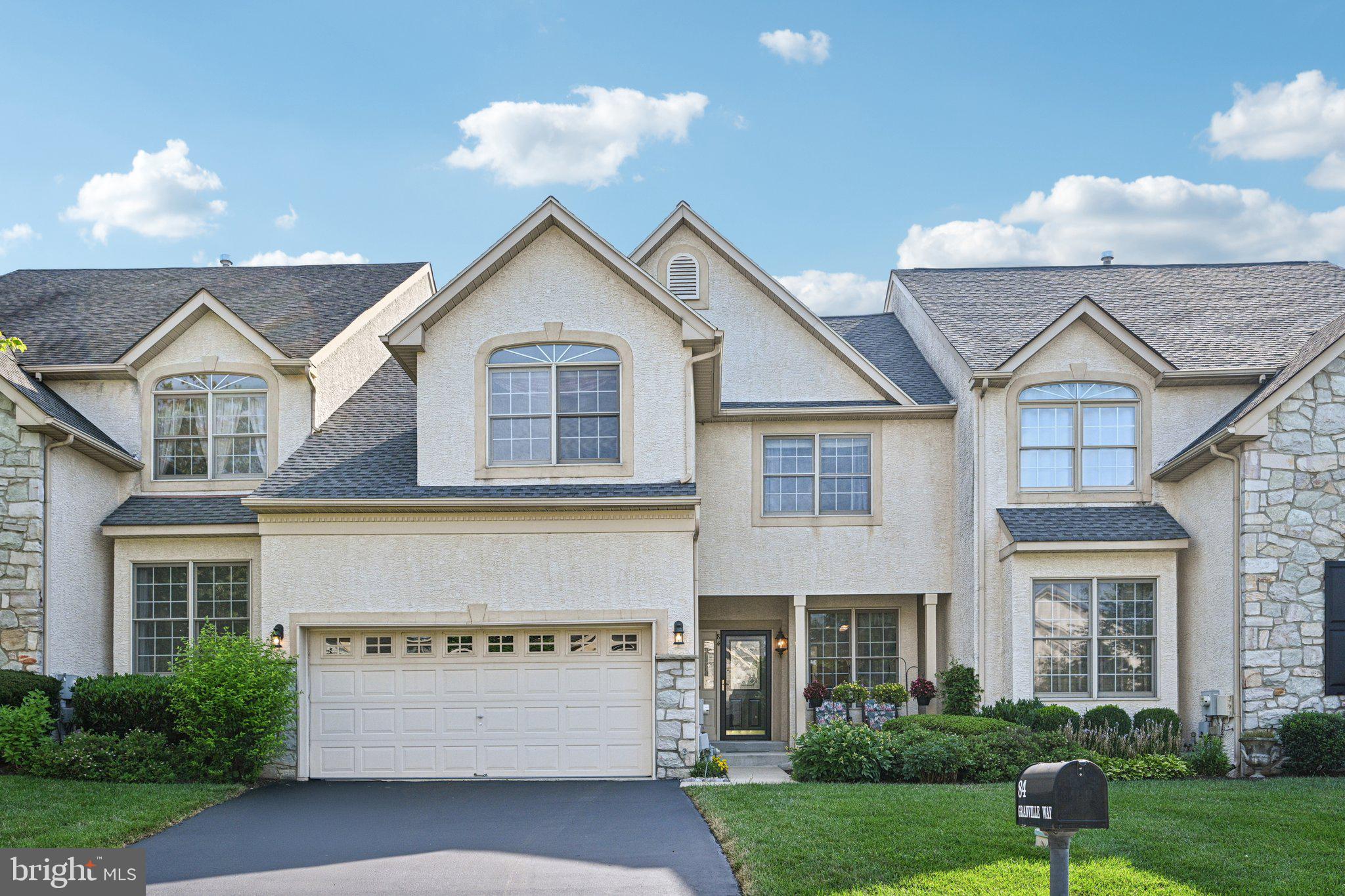 Situated in the highly desirable Malvern Hunt community, this spacious 3-bedroom, 2.5-bath home offers the ideal blend of comfort, style, and low-maintenance living — perfect for today’s lifestyle. From the moment you enter, you'll notice the thoughtful layout and abundant natural light throughout. The open-concept main level features warm hardwood floors and a flexible floor plan that adapts easily to your needs. Just off the foyer, the sunny breakfast area leads into a well-appointed kitchen, complete with classic white cabinetry and generous cabinet and counter space. The kitchen flows seamlessly into the bright and inviting family room, where windows and glass doors fill the space with light and provide access to the rear deck — a perfect spot for morning coffee or evening relaxation. A cozy gas double-sided fireplace anchors the room, adding warmth and charm. To the left of the foyer, you'll find a convenient powder room, a laundry room with garage access, and additional living space including a formal dining room and a formal living room — ideal for entertaining or quiet evenings at home. Upstairs, a spacious loft area overlooks the main level, offering a quiet reading nook or home office space. The primary suite is a true retreat, featuring vaulted ceilings, a large walk-in closet, a fabulous fireplace, and a luxurious en suite bath with a soaking tub, separate shower, and dual vanities. Two additional bedrooms and a full hall bath complete the second floor. The finished basement provides even more living space with endless possibilities — whether you envision a media room, home gym, playroom, or guest space, it’s ready to be tailored to your needs. Located in the award-winning Great Valley School District and just minutes from downtown Malvern, West Chester, and major routes for commuting, This home has been very well maintained and has a newer roof and HVAC! 84 Granville Way offers the best of both convenience and community. Don't miss the opportunity to make this beautiful home yours — schedule your showing today!