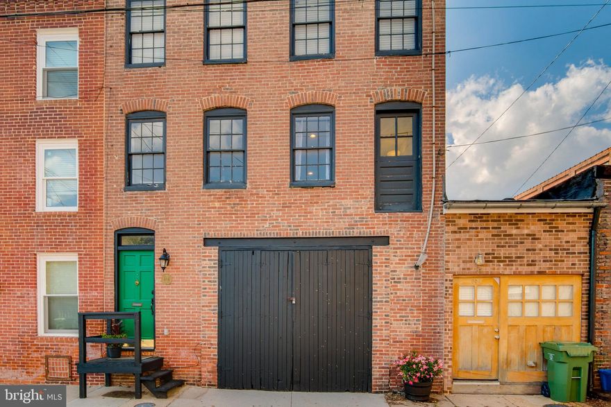 2 Car Garage***One of a kind home in Historic Ridgely's Delight!  There is no other house like it - you have to see it for yourself!  2 bed 2 bath - open floor plan and a 2 car garage with 14+ ft ceilings.  HW floors on main floor.  1 block to Camden Yards.  Close to UMMC, Light Rail, MARC Train, 295, 95, 395... M&T Bank Stadium, Inner Harbor and more!  Don't miss this opportunity to see this one of a kind home in Ridgely's Delight.