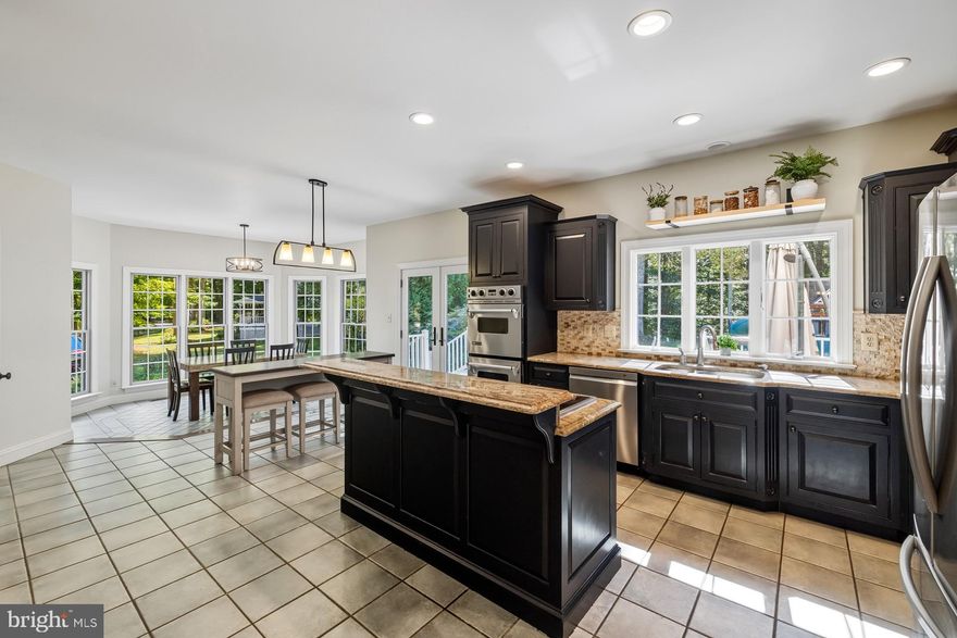 New Year, New Price! This is your chance to own one of Dunkirk’s best-priced luxury homes in the sought-after Tall Oaks community. Tucked away on a quiet 1-acre lot, 99 Hummingbird Court is the perfect match for buyers craving space, serenity, and style without sacrificing location.

Whether you’re dreaming of peaceful mornings surrounded by trees or weekend trips to the water, this is your chance to escape the hustle while staying just 30–45 minutes from D.C., Annapolis, and Chesapeake Beach.

With over 5,500 sq ft of finished space, this thoughtfully designed home offers 4 oversized bedrooms, 4.5 baths, and an expansive layout built for both entertaining and everyday living. Inside, you’ll find a sun-drenched 2-story foyer, formal living and dining rooms, a dedicated home office (or potential 5th bedroom), and a dramatic family room with catwalk overlook. The gourmet kitchen boasts a cooktop island, double ovens, butler’s pantry, and a bright morning room perfect for coffee or casual meals.

The finished walk-up basement features a custom bar, tasting room, and flexible entertaining space. Step outside to enjoy a large deck, fire pit area, and peaceful, tree-lined views, your own private retreat.

Major upgrades provide added peace of mind, including a new roof (2020), dual-zone HVAC systems (2022), and a whole-house generator.  Ideal for year-round comfort and reliability.

Best price per square foot in Dunkirk, this home is move-in ready, priced to sell, and designed for those who value quiet luxury, flexible living, and unbeatable access to both nature and the city.

Come experience life at 99 Hummingbird Court, where timeless comfort meets modern upgrades in one unforgettable setting.