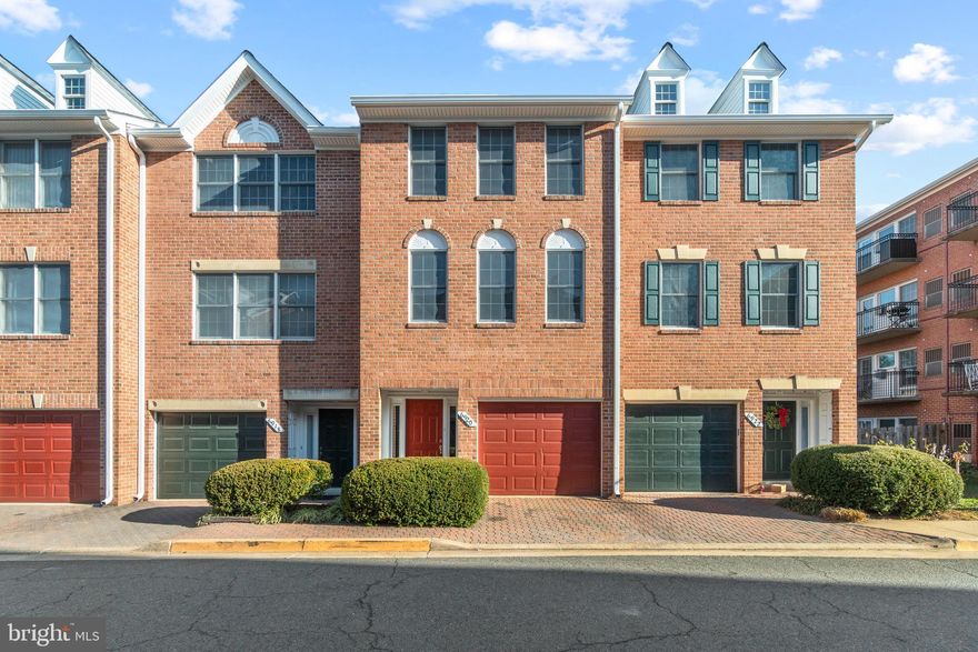 Freshly painted & New carpet ! 3 finished levels,  all brick townhome with one car garage  is now available in Falls Station!  3 bedrooms and 3.5 baths,  Light and bright with the natural light shining in! Enjoy the fireplace for those cold winter nights. Hardwood floors on main level & stairs. Bay windows & chair rail molding.  2 bedrooms on upper level with 2 full baths , 1 bedroom and 1 full bath on lower level. Owner's bedroom has a separate shower,  jetted tub and double sinks. Plenty of closets and storage space.  Fenced brick patio. Minutes to EFC Metro, I-66, Route 7 and Route 29. Enjoy Washington and Old Dominion jogging/biking trail, community tennis courts and park! This home is available  NOW for move in! One cat accepted, no dogs