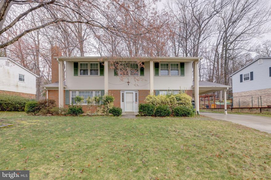 READY TO MOVE IN!   Beautifully updated Kitchen with ceramic tile floor, quartz counters, gorgeous cabinets, large eat in area  and lots of storage space.  Living Room has wood burning  fireplace and gets lots of light.  Separate Dining Room. Hardwood blinds throughout.  Enclosed Sunroom/Family Room off Kitchen opens to fabulous wooded, private yard.  All Bathrooms have been updated.   Walking distance to South Run Center and Elementary School. Metro bus stop in front of home and close to two slug lots! Energy efficient windows. New pillars in front are aluminum wrap. Increased attic insulation as well as 'attic wrap" e-shield. Small garden area. County easement property behind houme that ensure the forested area doesn't change. New gutters.  Roof on Sunroom 2008. Fios ready.