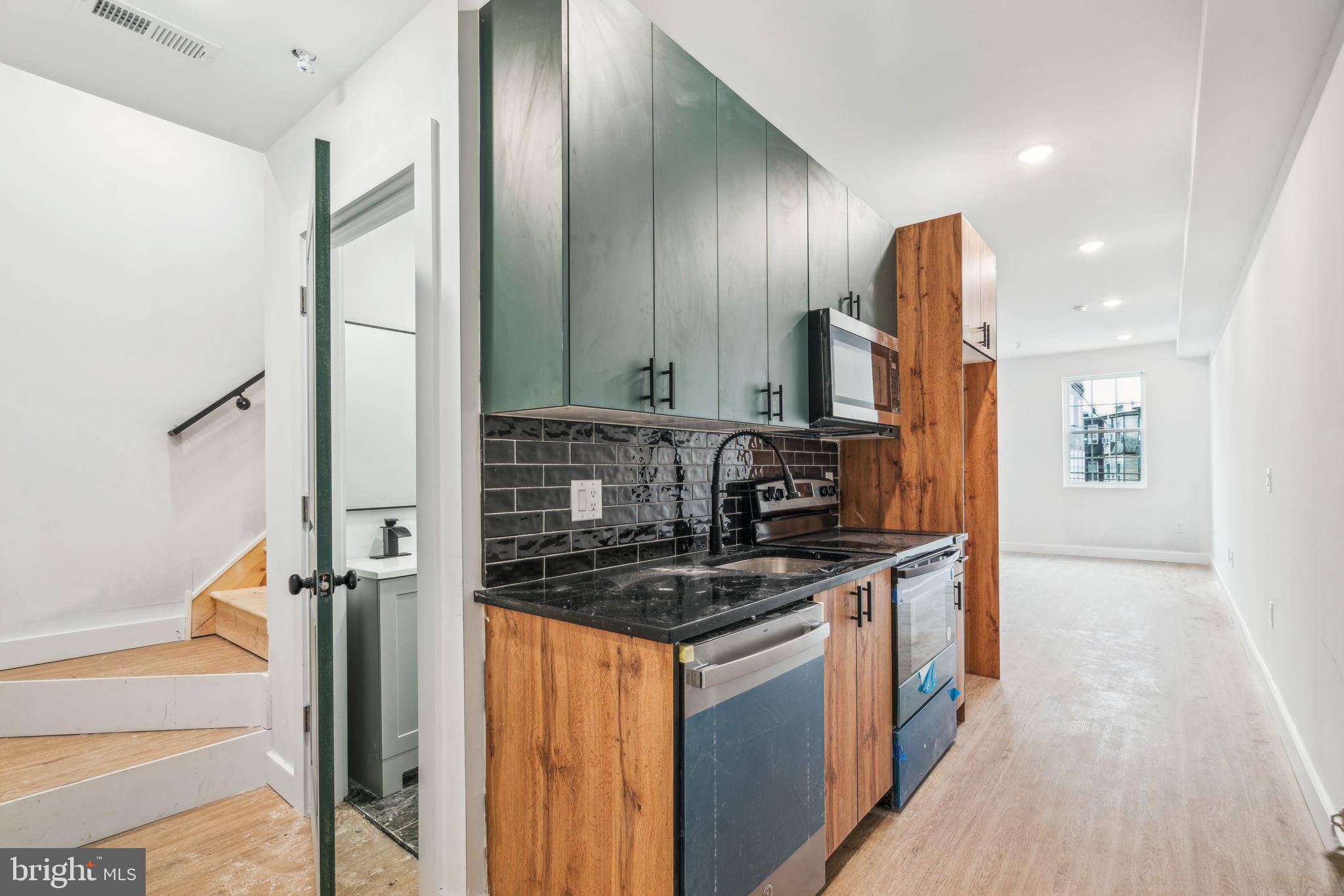 Be the first to live in this beautiful new construction home! Unit 3 features hardwood oak floors throughout with a black quartz kitchen island and modern stainless steel appliances. Two bedrooms filled with natural light, 1.5 baths, central A/C and heating, as well as a washer & dryer. This unit is complete with a private roof deck with views of the city. Schedule your tour today!
Tenants are responsible for the following utilities:
Water $75/mo flat fee (up to 2 people)
All electric (based on usage)
No gas
Internet
Text the listing agent for a video tour!
