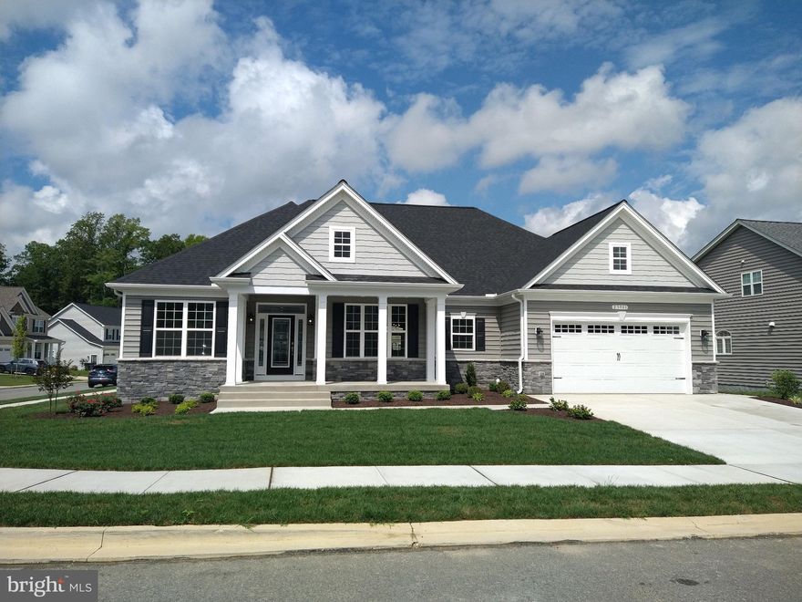 SOLD & SETTLED***Ashland Model with Stone Upg., Grand Kitchen, Deluxe Shower, Hardwood floors, 2' Front Ext & 2' Center Ext. Screened in porch, Quartz & Granite Countertops, Finish LL REC & LL Bath.
