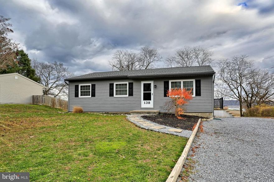 Enjoy a quiet neighborhood with picturesque views of Lancaster County farmland from the back patio and private back yard of this great home. Newer A/C unit, roof, siding and flooring make this home move-in ready. The large finished basement with half bath gives you added living space.  A 220 outlet is ready for a hot tub on the back patio.