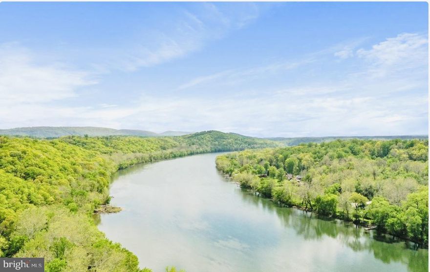 Beautiful riverfront chalet on the Potomac River in the desirable community of Potomac Terrace. This 0.47 acre lot includes river front lot 16 (41.79' wide top x 51' at water) river access with private floating dock, 20' x 50' concrete patio with electric hook-up and a community boat ramp. Breath taking views from the front deck of the river and the mountains! If you enjoy boating, fishing, kayaking, and jet skiing then this home is the one for you.  There's so much to enjoy about this riverfront home where you can feel like you're on vacation every day! 
Owner has done tons of updating over the last few years.  Quartz countertops in the kitchen and bathroom, updated flooring and paint, newer rubber roof, two car garage has electrical outlet perfect for charging your electric car or an RV. So many updates over the last few years. Call today to see this home before it’s gone.