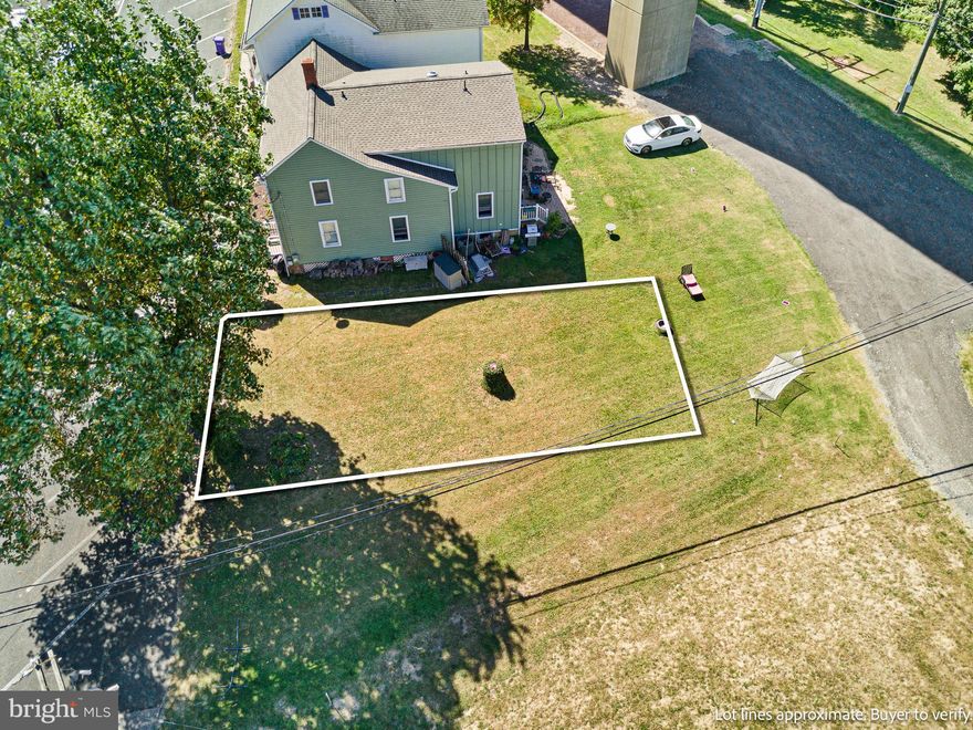 This rare buildable lot in Historic Chesapeake City comes with one pre-paid water and sewer hookup valued at $15,000. It has gorgeous water views. Possible uses with town approval are two commercial apartments on the main level, a duplex, and a single-family residence, as well as various potential commercial uses. Property lines are approximate, and the lot is 34 by 70.