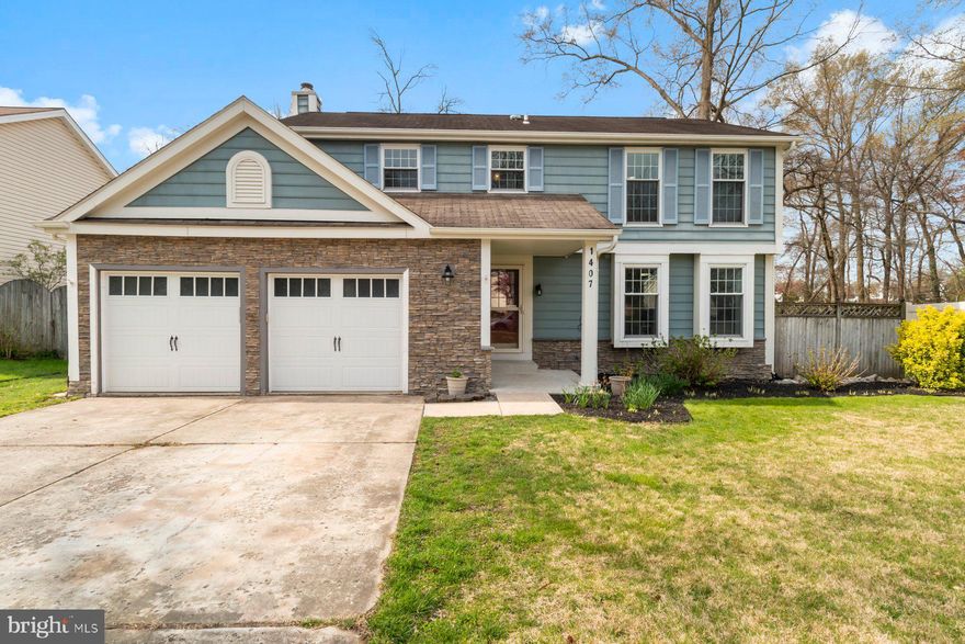 Welcome to this tastefully updated 4-bedroom, 2.5-bathroom Colonial nestled in the desirable Harman's Woods neighborhood.

As you step inside, you'll be greeted by a flood of natural light illuminating the main level, which boasts a formal living room, dining room, a kitchen with a cozy breakfast area, a spacious family room, and a convenient powder room.

Ascend to the upper level and discover the luxurious OVERSIZED King-sized Primary Bedroom suite, complete with a separate dressing area. Additionally, there are three generously sized bedrooms and a second full bath, providing ample space for the entire family.

The kitchen is equipped with modern appliances, including a refrigerator replaced in '23, a dishwasher updated in '21, and a range with a double oven, making meal preparation a breeze.

Cozy up by the wood-burning fireplace in the family room, which is currently being utilized as a dining area, perfect for entertaining guests or enjoying intimate family dinners.

Stay comfortable year-round with the high-efficiency HVAC system, replaced in 2020, and the water heater conveniently relocated to the basement.

The basement offers endless potential, fully waterproofed and awaiting your personal touch to transform it into additional living space or recreational area.

Parking is a breeze with a large 2-car attached garage, along with 4+ driveway parking spaces and ample street parking for guests.

Step outside to the rear yard, which backs to serene trees and is fully fenced with a combination of wood privacy and wire fencing, providing the perfect backdrop for outdoor gatherings or peaceful relaxation.

Conveniently located in Hanover, this home offers easy access to Baltimore, DC, and Annapolis, making commuting a breeze while still enjoying the tranquility of suburban living.

Don't miss out on the opportunity to make this your dream home!