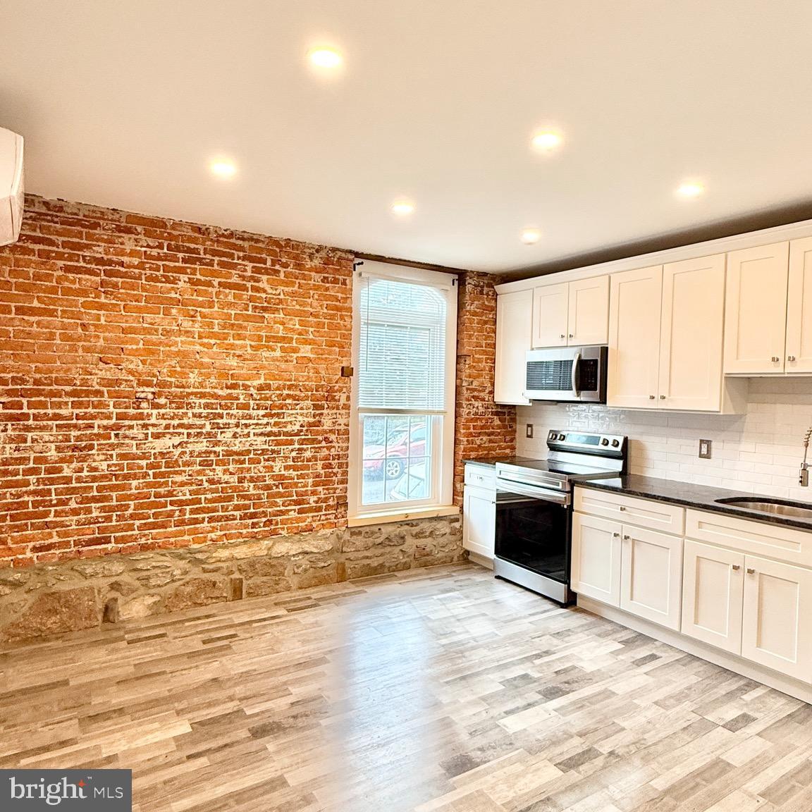 Welcome to Downtown, this building is KNOWN for its unique style and industrial vibes! Convenient to everything that Downtown Royersford has to offer! This 1 bedroom apartment is located on the first floor of a historic apartment building and is available for rent starting March 1st! Luxury vinyl plank flooring throughout, Stainless Steel Appliances- (Stove/Oven, Refrigerator, Dishwasher included), Granite Countertops, HIGH vaulted ceilings, Tile Bath with Shower, In-Unit Laundry and Central Air/Heat. This charming apartment has an eye to the future and a nod to the past with exposed beams but modern amenities. All of this and more with an excellent Downtown Royersford location; minutes from Rt 422, 724, SRT for walking/biking, kayak/boat launch and other area hotspots! Non-smoking Building. Small pet friendly with monthly pet rent (2 small pets max). Tenant pays for ONLY electric and cable/internet!! Rental Requirements: Everyone 18+ must apply via RentSpree application, 3 times Rental amount for gross monthly income. First month's rent, last month's rent and Security deposit equaling one month's rent- due upon signing of lease. All tenants will be screened.