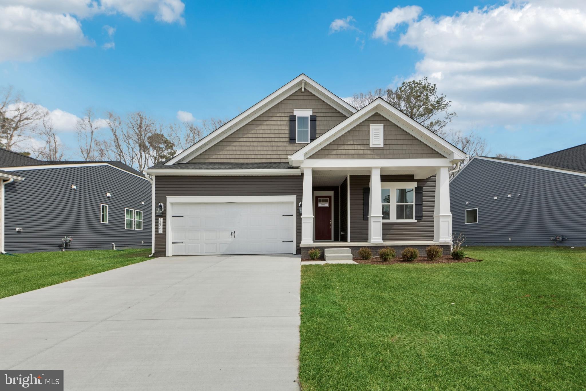 Discover the charm and versatility of the Kerr, a thoughtfully designed 3-bedroom, 3-bath home offering an open layout, high-end finishes, and spaces tailored for comfort. With a 3-car garage and flexible rooms throughout, this home adapts beautifully to everyday living or entertaining.
The main level features durable Luxury Vinyl Plank flooring, a warm fireplace, and a screened patio for year-round relaxation. A dedicated home office offers privacy and productivity, while the spacious loft upstairs provides extra space for lounging, hobbies, or guests.
In the kitchen, you'll find a complete stainless appliance suite, including a French door refrigerator, gas cooktop, and wall oven, all paired with quartz countertops, pendant lighting, and a designer tile backsplash.
Retreat to the primary bath with its walk-in shower featuring a seat and handheld shower wand, double sinks, and quartz surfaces. Flooring includes tile in all full baths and the laundry room, plus plush carpet in the upstairs loft and bedroom for cozy comfort.
For a full list of features for this home, please contact our sales representatives.
Photos are for display purposes only and may not reflect actual selections or layout.
Welcome to a new luxury active adult 55+ community on Maryland's Chesapeake Bay. Discover the amenity-filled, resort-style experience within 45 miles of Washington DC and Baltimore. Residents can take advantage of the community's 24,000 sq. ft. clubhouse with indoor & outdoor pools, a state-of-the-art fitness center, and multiple tennis and pickleball courts. With a full-time lifestyle director on site the community also features a well-maintained calendar of activities such as walking club, indoor and outdoor yoga sessions, mahjong club, kayaking, pickleball and more. Kent Island life is about making friends and enjoying the company of people who have worked hard and now want to enjoy all that a luxury 55+ community has to offer. Located steps from the water and minutes from Annapolis, the location also offers quick access to Rt. 50. Enjoy the convenience of nearby dining and shopping options together with the quaint charm of a small town. *Pictures are representative of a similar home.