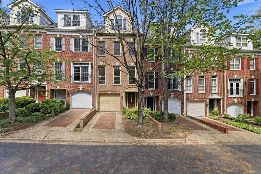 Tucked into Palisades Park just minutes from Rosslyn, this four-level brick townhome offers a flexible layout, bright living spaces, a one car garage with driveway, and a location that’s hard to beat. Oversized windows on the main level fill the home with natural light, highlighting the open flow between the living area and kitchen—complete with table space and a layout that works well for both everyday living and entertaining. Upstairs, the third level features a spacious primary suite with an en-suite bath, dual sinks, and a soaking tub. The top level offers a private retreat that works perfectly as a secondary primary or guest suite, complete with a full bath and generous storage.
The lower level adds even more versatility with a comfortable living space, a second fireplace, and full bathroom—ideal for a rec room, home office, or guest area. Step through the sliders and enjoy your private flagstone patio.  Well-maintained and thoughtfully laid out across four levels, this home offers space, functionality, and flexibility that is hard to beat. 
What truly sets this property apart is its location within one of Arlington’s most sought-after and convenient neighborhoods. Enjoy the nearby commuter routes, easy access to Metro and Reagan National is also a few minutes away.  Shopping, dining and nightlife options are endless in nearby Clarendon, Georgetown, and Old Town Alexandria.   The chance to own in Palisades Park does not come along often. Be sure to join us for Open Houses the weekend of 4/17.