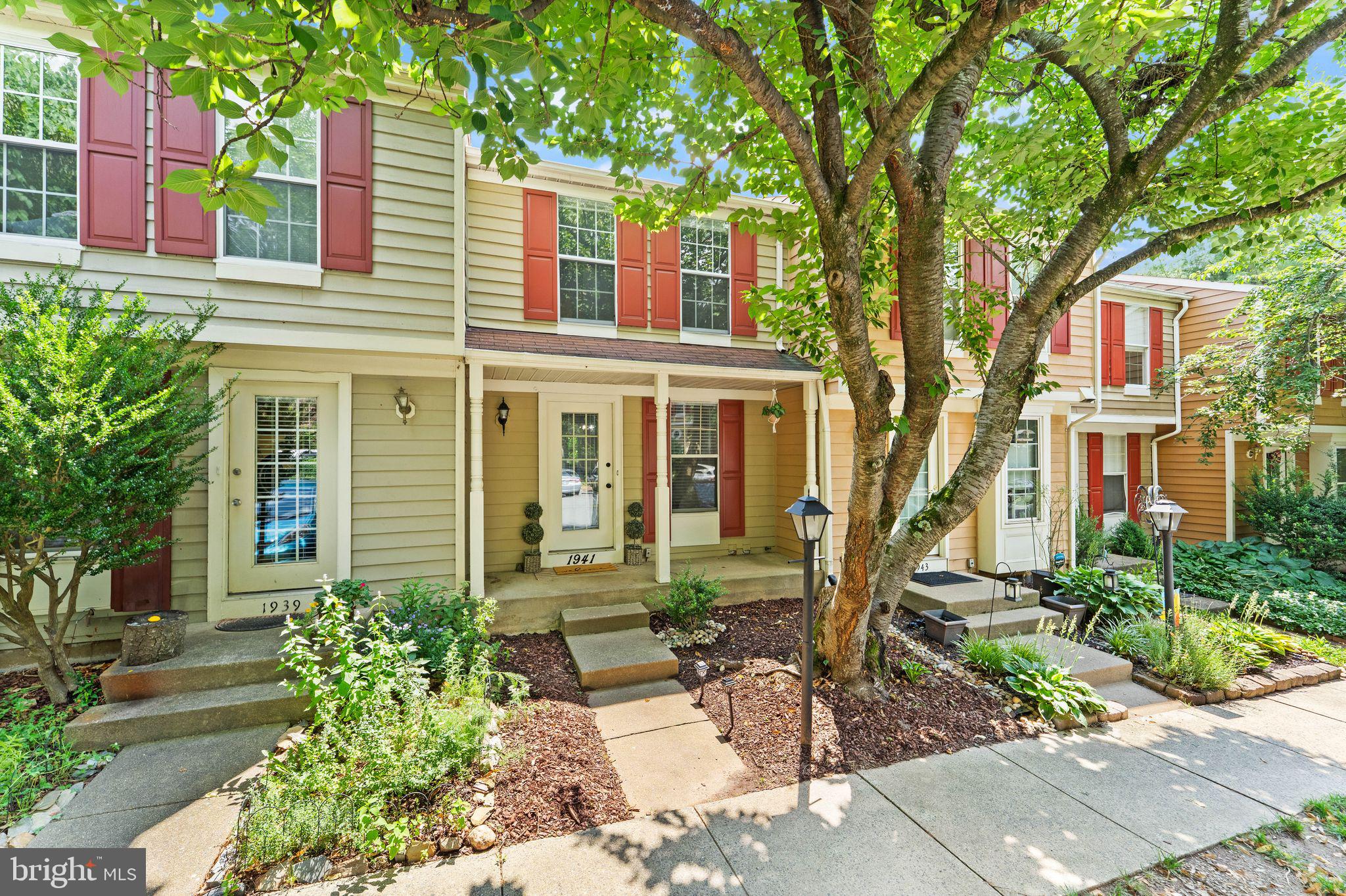 Welcome to 1941 Sagewood Lane! This charming 2 bedroom, 2 bath home is ideally located across the street from South Lakes Village Center and is walkable to Lake Thoreau and the Silver Line Metro. The main level has beautiful floors that lead into a gourmet kitchen and then to a large deck that backs to woods, a perfect retreat after a long day. The upstairs features an expansive primary suite, a secondary bedroom and a full bathroom. Downstairs is a full bath and living area that leads into a fenced in backyard area. Nestled inside a beautiful community that is part of the Reston Association and gives you access to amenities such as pools, tennis & pickleball courts, extensive walking trails, serene lakes, tot lots, and beautifully maintained parks. All this and convenient access to the Dulles Toll Road and Reston Town Center make this a home that you do not want to miss. Schedule your appointment to see this beautiful home today!