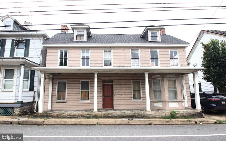 Investor special! Large Colonial located just a block from the heart of downtown Boonsboro, this house features over 2,000 square feet of living space that includes 5 bedrooms and 2 full bathrooms (one on each level), hardwood floors, fully floored attic, new roof on most of the house, a large back yard, and detached garage.  House is in need of a major rehab, but there is so much potential!