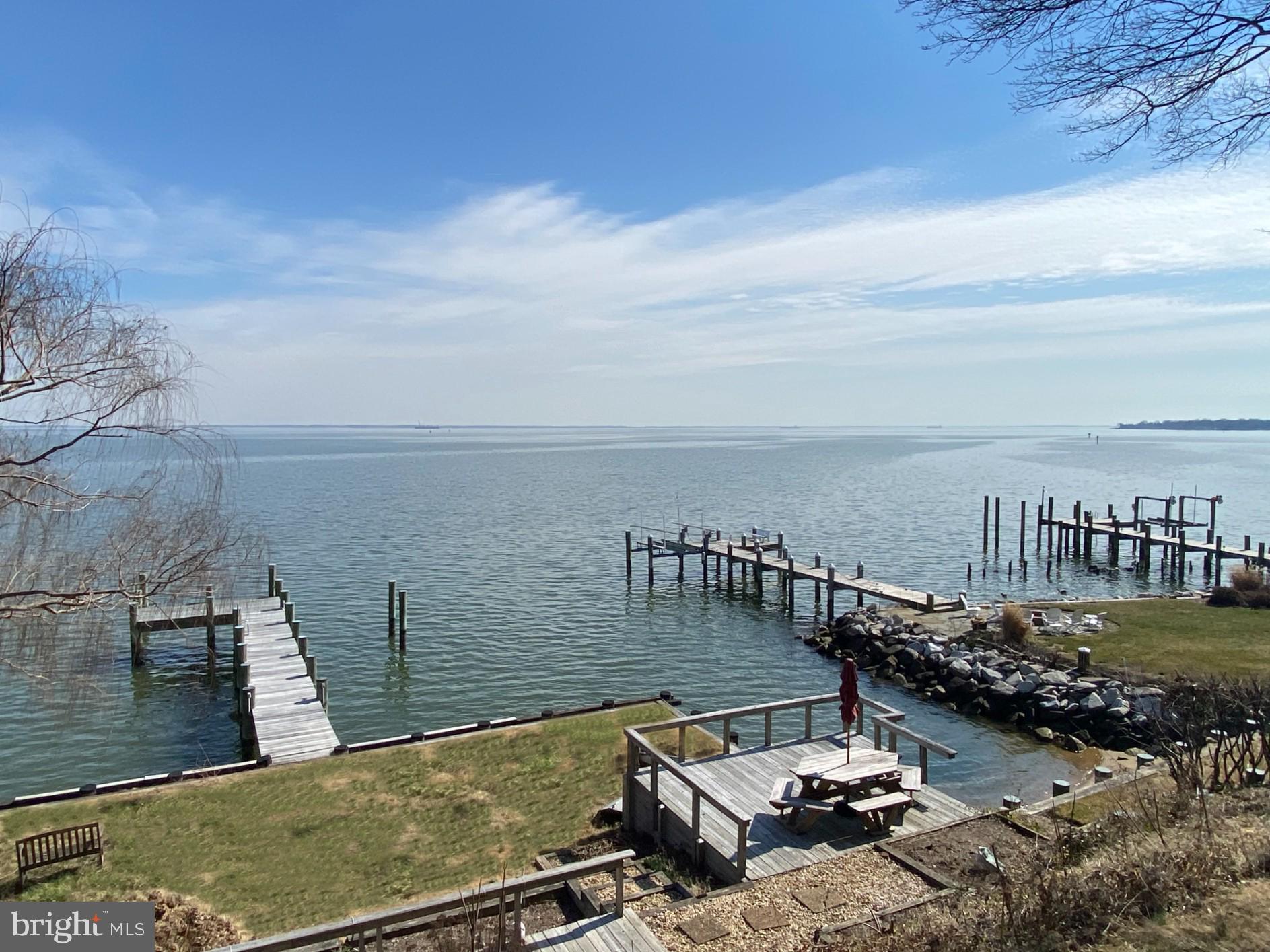 Eastern Avenue Waterfront! A rare offering, this premium waterfront property on prestigious Eastern Avenue in Eastport provides awe-inspiring panoramic views of Chesapeake Bay, Severn River and Back Creek. This property suits a variety of needs and its expansive footprint provides endless possibilities for renovations or a full re-build. Civil Engineer plans by CPJ Associates, Inc. as well as the Architectural Plans by local renowned architecture firm Purple Cherry Architects, convey with the property. The distinctive existing home with over 3,300+ sqft of living space boasts water views from almost every room and features a gourmet kitchen with shaker-style cabinets and granite countertops, 5 bedrooms and 4.5 baths including an in-law wing with family room, fireplace, kitchenette and bedroom suite with panoramic views. Perfectly sited on this elevated lot to maximize the 180 degree views, the property is in a prime location for enjoying all that Eastport and Annapolis has to offer. Relax with a morning coffee on the multiple-tiered decks cascading towards the waterfront and savor the magnificent sunrises over the calming waters of the Bay. The private pier offers the ideal setup for the boating enthusiast. Just steps outside the front door enjoy strolling the artful and nautical streets to amenities like; five-star restaurants, shops, pubs and city parks. Pop across the Spa Creek drawbridge or motor in the water taxi over to Annapolis and soak up the vibrant city vibe or just kick-back to watch the daily parade of boats or view the annual fireworks displays and the flying skills of the Blue Angels from your private dock. Eastport/Annapolis offers the perfect balance of small-town charm and big world sophistication. Located just 5 miles to Rt. 50 and 97 which provides direct access to Baltimore, BWI, Ft. Meade/NSA and Washington, DC. This property is a must see!