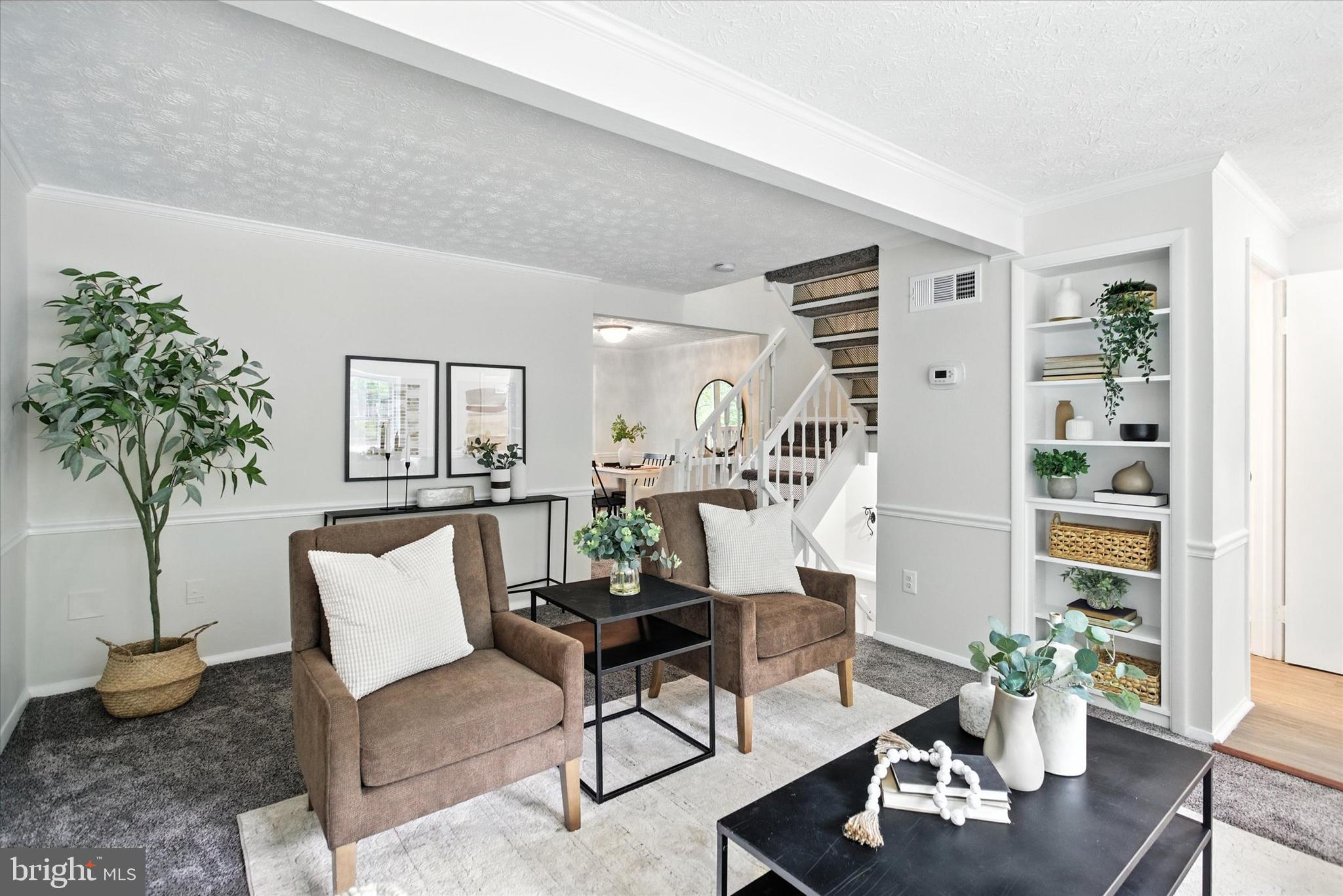 Welcome to this spacious three-level end-unit townhouse in Springfield, VA, offering both comfort and convenience. The main level features a bright living room, spacious kitchen, powder room, a family dining area with double sliding doors that open onto a deck overlooking trees and peaceful scenery. Upstairs, the primary bedroom includes its own private bath and walk-in closet, while two additional bedrooms share a full hallway bath. The fully finished lower level offers a large recreation room with a cozy brick gas fireplace, a separate office or flex room, a full bathroom, laundry and utility area, and a walkout basement leading to the backyard. Outside, enjoy a fully fenced yard with a patio and storage shed, perfect for entertaining or relaxing with added end-unit privacy. Conveniently located near parks, shopping, dining, and major commuter routes including Fairfax County Parkway, I-95, and the Franconia-Springfield Metro. Why You’ll Love It: End-unit privacy, spacious and functional layout, a backyard retreat, excellent location, and commuter-friendly making this home a rare find. Schedule your tour today!