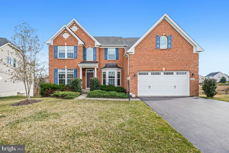 Welcome to this impeccably maintained Colonial in May’s Quarter. Perfectly situated on the largest lot in the neighborhood at almost a third of an acre and backing to mature trees for added privacy. Outdoor living shines with a spacious deck and a beautiful ground-level stamped concrete patio — ideal for relaxing or entertaining. Inside, the main level offers a generous kitchen with breakfast area, inviting family room with gas fireplace, formal dining room, living room, and a private den highlighted by a charming bay window. Beautiful wood floors on the main level. Upstairs, the expansive primary suite features a luxurious bath with a huge soaking tub, separate shower, dual vanities, and walk-in closets, plus the convenience of an upper-level laundry room. The walk-out basement is perfect for extended living or guests, complete with a large media room, bedroom, full bath, and an impressive bar area with cabinetry, granite counters, wine refrigerator, and sink — ideal for entertaining or creating an in-law or au-pair suite. Schedule your showing today!