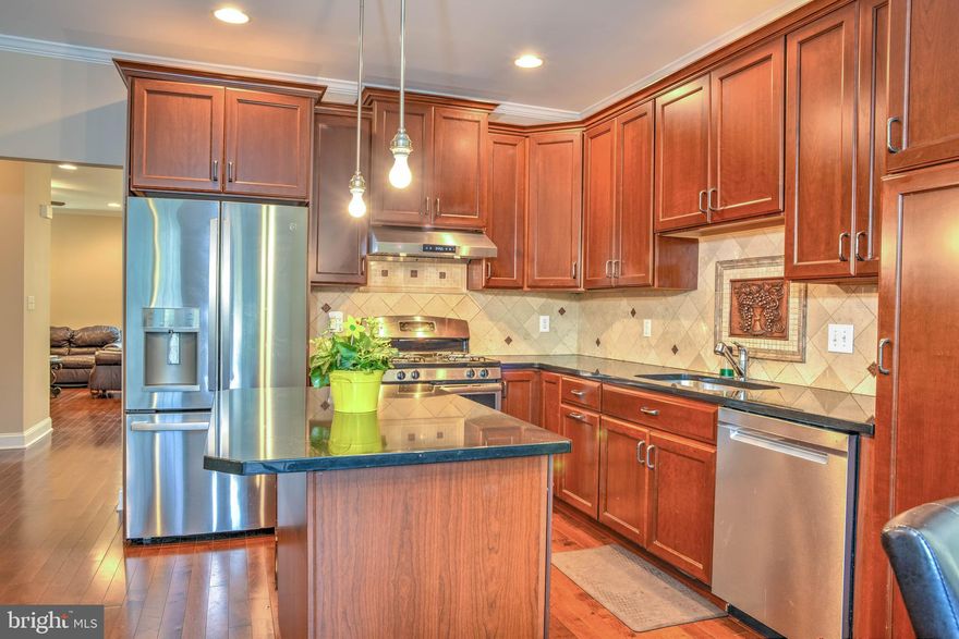 Stunning 3 Bedroom End-Unit Townhouse in Neshaminy School District

Welcome to this beautifully maintained 3-bedroom, 2.5-bath end-unit townhouse with a finished basement and a spacious two-car garage, located in the highly sought-after Neshaminy School District.

Step inside to find gleaming hardwood floors throughout the main level, setting the tone for the elegant and inviting interior. The heart of the home is the amazing kitchen, featuring modern cabinetry, granite countertops, stainless steel appliances, and a large island—perfect for entertaining or enjoying casual meals.

The open-concept layout flows seamlessly into the sunlit family room, where a cozy fireplace adds warmth and charm—ideal for relaxing evenings at home. Large windows throughout this end-unit home bring in abundant natural light.

Upstairs, you'll find three generously sized bedrooms, including a luxurious primary suite with a private bath and walk-in closet. The fully finished basement offers flexible space for a home office, media room, gym, or playroom—tailored to your lifestyle.

Outside, enjoy privacy and extra green space thanks to the premium end-unit location. With easy access to shopping, dining, major highways, and top-rated schools, this home has it all.

Don’t miss your chance to own this exceptional property—schedule your private showing today!