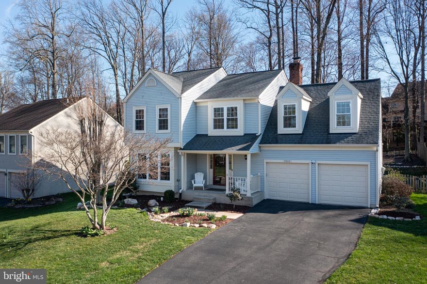 Don't miss this FABULOUS MOVE-IN READY home with over $350,000+ & 3 a level addition!  This all adds  class & space to the back of this STUNNING home!  Open the door to a 2 story vaulted foyer with hardwoods throughout the entire first floor, plus the staircase & an electric shade over the large palladium window, which controls the light entering the foyer. A sunny living room greets you to the left along with a dining room! But it is the kitchen / family room / sunroom which takes your breathe away!!  This kitchen is any chef's pure DELIGHT.  Enjoy a 6 burner gas cooktop, a built-in convection-microwave, oven, a warming drawer & a huge farmhouse sink. Immerse yourself in the quality white & grey kitchen cabinets & the huge island which seats 5 & is accented with tasteful tile & granite. A double chef's Electorlux ICON refrigerator also is the upmost in convenience!  The kitchen also boasts a built-in water filter. The adjoining family room has a brick fireplace & a wood-burning heatilator to warm those chilly winter evenings. An impressive 3 season's sunroom with EZE BREEZE hidden windows makes this room truly a four season delight. The brazilian cherry wood is the ultimate in luxury & mirrored in the warm cedar roof with white mood lights & a quality fan.  Stepping out of this room is the hardscaped patio where a firepit along with a large area for seating, eating, barbequing (deck is plumbed for gas) & entertaining takes place!  This fully-fenced in yard also has LOADS of room for pets & play & swing set & trampolines if your heart so desires  & it backs to common area. Upstairs you find 4 good-sized bedrooms (1 is particularly large). The primary suite  is large that it has the added space for a private sitting room! Two updated bathrooms also complete this upper level. Moving downstairs you find a convenient separate laundry - storage room, a large fully EGRESSED 5th BEDROOM, plenty of storage closets & a recreation room to enjoy too.  Enjoy the following updated systems; (2025) 2 upscale camera accessible garage doors, (2023) New Hot Water Heater, (2018) TWO New HVAC's, (2017) New Screened-in Porch, (2017) New 3 Level Addition,  (2016) New Roof!  Situated in Fairfax Station with a 1/2 mile walk to Lake Mercer, this home gets to also use 2 nearby pools with associate membership. Quick & easy access to the Fairfax County Parkway also makes this home super desirable. Fantastic commute options into DC, Pentagon & Fort Belvoir via nearby Commuter Lots,  Springfield Franconia Metro,  VRE & bus.  This home is also linked to all the nearby Fairfax Station myriad of walking/ biking / jogging trails along with nearby basketball courts & playgrounds too.   This home is proud to be part of Silverbrook Elementary & South County High School pyramid which is also a very short drive away!  Welcome Home!