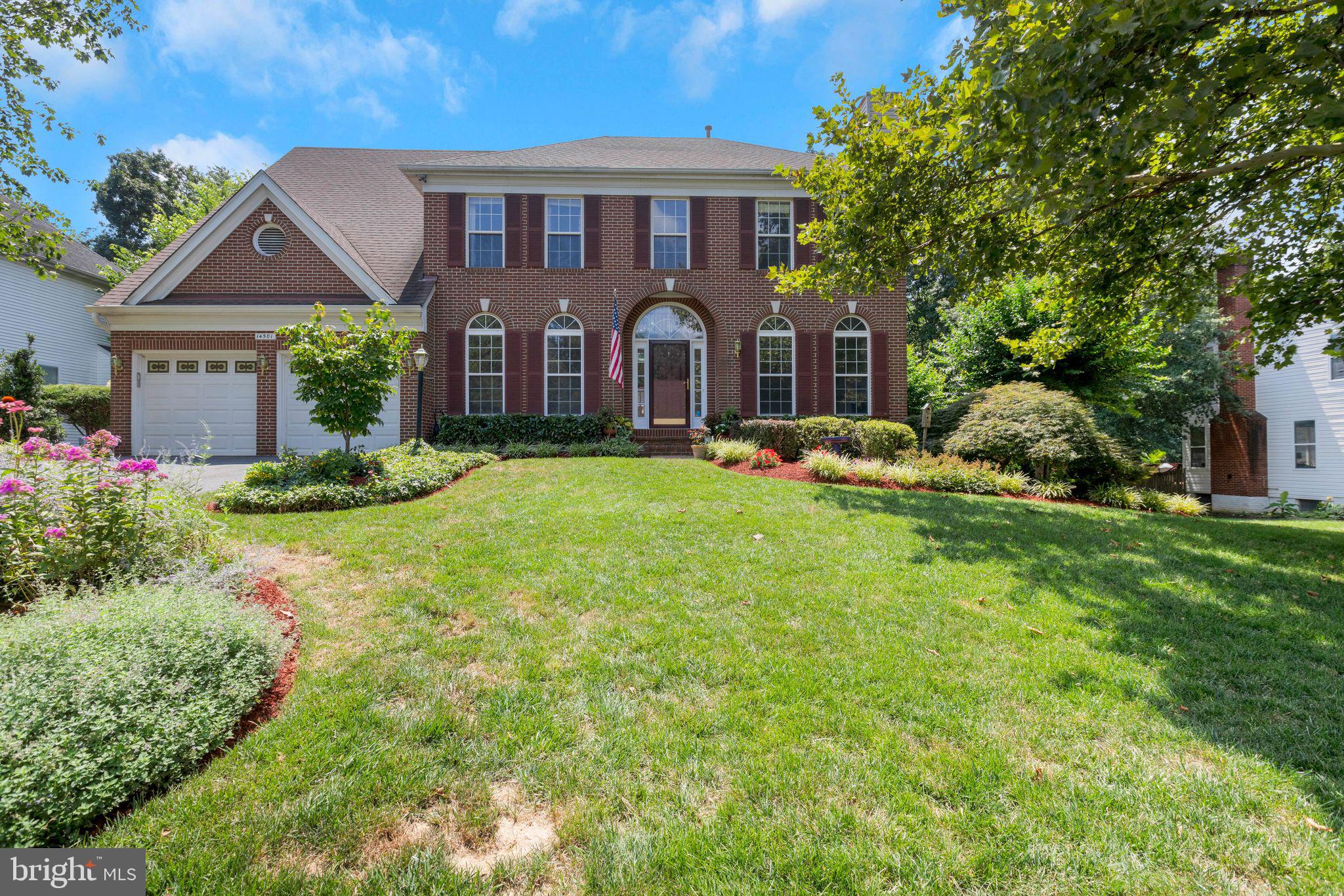 An elegant and expansive residence ideally situated in the heart of Centreville, this stately two-level brick front home offers 5 generously sized bedrooms, 3.5 baths, and a thoughtfully crafted layout that blends timeless architecture with modern functionality. The main level welcomes you with a two-story foyer and living room highlighted by Palladian windows, 9' ceilings anchored by a classic fireplace, setting the tone for warm and sophisticated gatherings. Glass-paneled French doors open to reveal a dedicated library/home office with a coveted bay window—offering remarkable versatility for work, study, and relaxation. A character-rich, country-style kitchen combines charm and practicality, seamlessly connecting to a spacious family room perfect for daily living and entertaining. The renovated kitchen comes equipped with upgraded appliances, cabinets, and deluxe quartz countertops. A formal dining room, wet bar, and a well-appointed powder room complete this level with effortless flow. The main level is finely accented with decorator touches, crown molding, and gorgeous Brazilian cherry wood flooring. Upstairs, the primary suite features vaulted ceilings for a tranquil retreat including a spa-inspired ensuite with a soaking tub, glass-enclosed shower, and dual walk-in closets. Three additional bedrooms with plush carpeting and generous storage are complemented with another upgraded bathroom and extensive storage in the attic, easily accessed through pull-down stairs. The fully-finished walkout basement provides additional living space with a private bedroom, full bath, and its own rear entrance—ideal for extended stays, in-law accommodations, or potential rental use. Enjoy the expansive rec room accented with plantation shutters. Outdoors, a screened-in porch offers a serene setting overlooking the fenced-in wooded lot with views of mature trees and adjacent parkland with affording a rare sense of privacy and connection to nature. Relax and enjoy a beautifully landscaped, low‑maintenance yard enhanced by an in‑ground sprinkler system for effortless care. A two-car garage and expansive driveway add to the home’s everyday convenience. This former Centex Shaw model is set within a well-maintained HOA community and offers the best of both worlds—secluded, nature-filled living just minutes from top-rated schools, commuter routes, and Centreville’s vibrant shopping and dining scene. The community club house features a pool, fitness center, racquetball, tennis, and pickle ball courts. The Centre Ridge community is conveniently located closely to two shopping centers, a library, movie theater, and neighborhood elementary school. This prime location in Northern Virginia is just minutes from routes 66, 28 and 29 - all major thoroughfares in the region. A rare opportunity to own a home that perfectly blends luxury, flexibility, and tranquility in one of Northern Virginia’s most sought‑after communities. This turnkey gem is ready for your immediate enjoyment—schedule a private showing today.