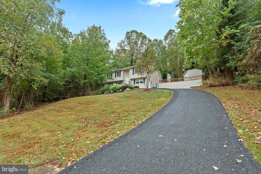 A must see! Beautiful 3 Bedroom 2 and 1/2 bath Split Foyer.  Brand new carpets, appliances, paint, flooring, back splash, updated bathrooms and much much more.  Ready for you to move right in!  Downstairs features a huge rec room,  a half bath, separate laundry room and a spacious closed in workshop area. Schedule your showing today!!!