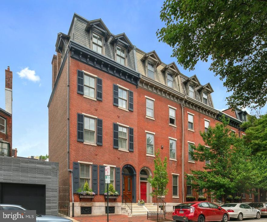 1860s Federal style townhouse, completely rebuilt in 2001, and continuously updated and refurbished since. Like-new condition with state-of-the art systems. Great natural light from north-, south-, and west-facing windows. Superb Rittenhouse Square location. 3,945 square feet smartly arranged over 4 floors, the house boasts living room, dining room and kitchen, den, 4 bedrooms, 3.5 baths, home office with adjoining kitchenette (could be 4th bedroom and bath), substantial closet space, full basement, garden terrace and enclosed 1-car parking (could be 2). The renovation attended to all major infrastructure issues including: new windows, exterior window trim, and steel lintels for the back windows; rebuilt roofs and a re-slated mansard; full brick pointing, front, back and side; basement floor excavated and a new concrete floor; all new copper and cast-iron pipes; insulation behind newly built interior walls, and a new brick sidewalk. The house was also given all new wiring, heating and cooling systems, European limestone in new kitchen and baths, and new lighting, sound and security systems. In order to retain the historic character of the house, all new moldings were milled to match the original profiles, all internal doors were replaced with new solid-wood doors and Baldwin hardware, new cedar shutters were added, the front-door was replaced with period-appropriate walnut doors, new crown moldings were added throughout, new basement window guards were cast, and numerous other details were restored or accurately replaced. The overall effect is a house with the grace, scale and proportions of a period home with the clean lines and modern infrastructure of a new house. First floor: The light-filled living room has grand proportions and features a wood-burning fireplace. It seamlessly connects with the dining room and kitchen. The kitchen is outfitted with Bulthaup B3 cabinetry and Gaggenau 400 series appliances - 36" flex induction cooktop, 30" oven, combi-microwave oven and warming drawer, fridge-freezer and dishwasher. The living room and kitchen open to a 325 square foot terrace. The first-floor is ideally suited for informal daily living as well as entertaining. The second floor is comprised of family room, powder room and Master bedroom suite. The family room has generous proportions and fireplace. It is bathed in northern and western light. French doors lead to a beautifully fabricated Juliet balcony. The MBR suite is equipped with built-in closets echoing the historic fabric of the home and a luxurious master bath with Agape soaking tub, large walk-in shower, custom double vanity and linen closet. The third floor is comprised of two large bedrooms, two master-quality bathrooms, and Miele laundry facilities. The fourth floor features a large home office, with unobstructed western and southern views. There is an adjoining kitchenette/dining area equipped with Bulthaup cabinetry, sub-zero under-counter fridge/freezer, and 18" miele dishwasher. The terrace area is 325 square feet landscaped with a Blue Atlas Cedar, Japanese Maple and potted plants. There is secure parking for one car adjacent to the terrace. The terrace/parking areas could be reconfigured to accommodate 2-car parking. The terrace and parking areas were repaved in 2019 with black-grey Pennsylvania slate, and both are equipped with a snow melt system. The house was completely rewired in 2001, and lighting controls were recently upgraded to Lutron Homeworks. Art and task lighting throughout the house were specified by lighting design specialists. Detailed information on the technology (network, telephone, TV, sound), HVAC, lighting and controls can be found in the Seller's Disclosure.