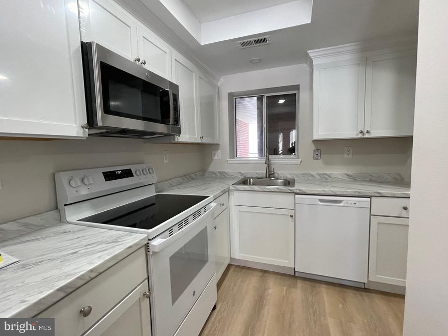 This spacious condo in age 55+ community has been totally renovated! In the kitchen are new cabinets, new appliances, and granite counters. Both bathrooms have been renovated as well. The entire unit has new LVP or ceramic flooring and nice neutral paint. All you need to do is move in! The amount of closet space is impressive, and there is additional storage in your assigned carport. All utilities, cable TV, and internet are included in the rent. This well-established independent senior living community has so many amenities and activities, to include clubhouses, an 18-hole golf course, tennis/pickleball courts, fitness center, swimming pools, classes, art studios, woodworking shop, choral and theater groups, performances, restaurants, shuttle service, and walking trails, just to name a few! Just outside the main gate is a shopping center with a grocery store and pharmacy, banking, and restaurants. Come enjoy this amazing community!