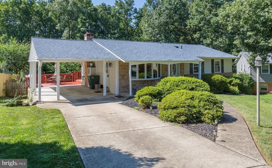 Owners meticulously prepared this home for you! Pride of ownership gleaming everywhere! Serene yard, huge deck, koi pond, beauty every direction! Upgrades throughout, New French doors to deck, hdwd floors main lvl, cozy carpet mstr & fam rm. NEW 50 year architectural roof! Custom Kitchen must see! Motorized awning/shade all day! Insanely cool Bar area in basement! 4 bds, 3 full ba, carport! NO HOA