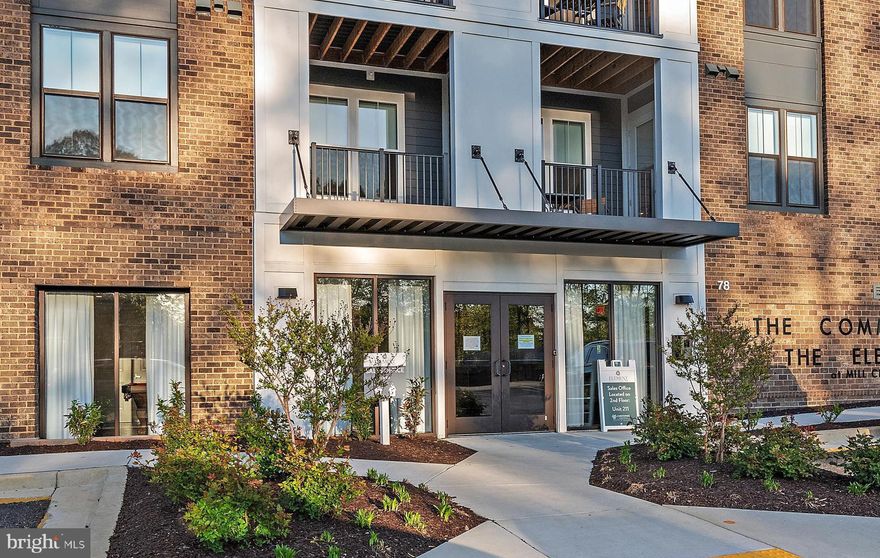 This stunning penthouse in an exclusive 55+ community offers low-maintenance living a few minutes from Annapolis. The expansive fourth-floor corner unit offers a quiet respite from everyday life. Nine-foot upgraded tray ceilings and plank flooring add an elegant touch throughout.  LVL flooring throughout the unit.  The gourmet kitchen is an entertainer's dream with a huge island, stunning countertops, tile backsplash, and tons of quality cabinetry. Upgraded  kitchen appliances.  Kitchen faucets are "touchless". Samsung high-efficiency washer/dryer included. The living and dining area offers room for large seating areas for relaxing in front of the game and a dedicated space for gracious dining. Pendant lights over kitchen peninsula, dining room Two bedrooms each feature an ensuite bath with high-quality finishes and a spa-like feel. The two bedrooms are separated with a long hallway for optimum privacy, and each has customized closets in the owner suite step in, spare bedroom.  Also custom shelving in the pantry and guest bathroom. There are two bonus living spaces that can be used for additional sleeping areas, exercise/media room, or offices.  Custom-built cabinets in the space next to "owners' suite". Three ceiling fans included.
The Element at Mill Creek offers a fitness center, golf/sports simulator, and walking trails. Pickleball courts and a dog park are in the works. With a secure entry, garage parking, and elevator access, life is safe and easy! Assigned garage space (#CG-24) is included and valued at $25,000.  Assigned storage cage (#26)  is included. You will be a hop, skip, and a jump from Annapolis and restaurants and waterfront activities. You will have quick access to Route 50 and major arteries.
