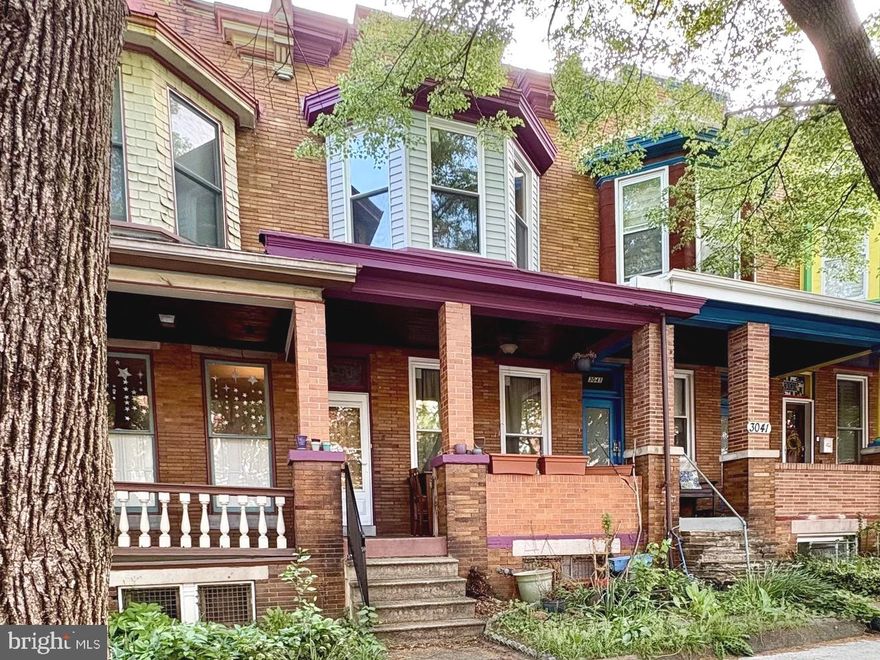 Investor Alert or First-Time Buyer Opportunity in Charles Village! Discover the perfect blend of instant equity and immediate livability at 3043 Guilford Ave. This classic Baltimore rowhome is the ideal "sweat equity" find for those looking to customize a home without the pressure of a full gut-rehab. While the property is in need of some cosmetic TLC to reach its full potential, it remains entirely functional and move-in ready, allowing you to update at your own pace. The main floor features a spacious living room, formal dining room, kitchen, and a convenient half bath, while the upper level offers three bedrooms and one full bath. The lower level provides a  laundry room and ample additional storage.  Significant "heavy lifting" has already been completed, including a newer roof and the installation of new mini-split systems on both levels for high-efficiency, zoned heating and cooling. Boasting classic bones, high ceilings, and original architectural character, this home is perfectly situated just blocks from Johns Hopkins University and the 32nd Street Farmers Market. Home is being sold strictly As-Is—bring your paint samples and creative vision to this solid investment in a high-demand area!