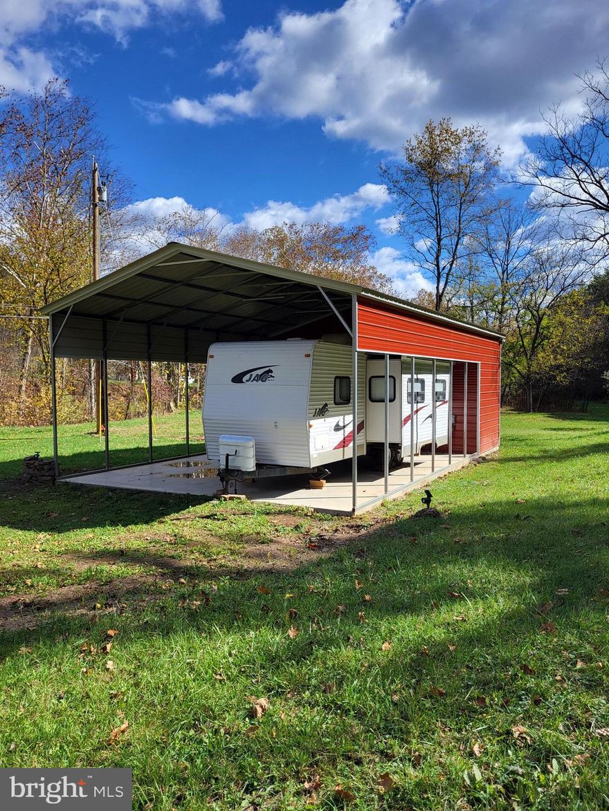 CAMPING, HUNTING, RELAXING, ESCAPE

Have you been looking for a place that is large enough acreage to roam, turn key and ready to enjoy immediately? With just over 34 acres this property offers the feel of two separate properties within the boundaries of one.  Along the banks of the small creek sits a brand new metal building with a small section that is finished and an overhang where the camper is parked. Total building size is 24x40 with electric and has internet cable at location but not hooked up. Just off the corner of the building is a large stone fire pit to enjoy the heat on those crisp cool nights.

As you venture the property there is roughly 1 acre of flat ground that could be planted into a food plot, large garden or extended yard. The power runs further down in a clearing that could be mowed or left as native vegetation. The ridges look intimidating but there is a great ATV or hiking trail that has been carved into the hillside leading to the oak flats. This is where it feels as if it is two properties. Instantly you are met with large oaks and hickories speckled across the landscape that tower above. In this location you will find a make shift ground blind that overlooks the valley below. Plenty of deer and turkey sign can be found making this property fantastic for a hunter. Rubs and scrapes can be followed right to the neighboring ground that was recently select cut giving the local deer herd seclusion and bedding. The benefit there is they use this property as a travel corridor and feed on the acorns.

Just above the gate is a large ridge where you can see over 180 degrees of surrounding mountains. Along the spine of the ridge is a rock wall that has origins dating back to the 1800s. This ridge as well gives another location to hunt, hike or adventure the landscape. 

Properties of this magnitude and features will not hit the market often so give me a call today.