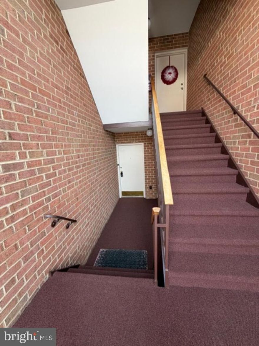 A well-maintained two-bedroom, one-bath condominium offering easy, low-maintenance living in the established Crestwood Condominiums of Manassas. Nestled in a peaceful, tree-lined community, this move-in-ready home is accessed by a short flight of stairs and features a comfortable, well-designed layout filled with natural light.

Inside, the living and dining areas flow seamlessly, creating an open and welcoming space ideal for everyday living and entertaining. Sliding glass doors open to a private patio—perfect for morning coffee, evening relaxation, or a personal garden retreat. The kitchen provides ample cabinetry and counter space to support daily cooking needs. Assigned Parking - Parking  Spot #7

Both bedrooms are generously sized and versatile. The primary bedroom offers abundant closet space, while the second bedroom is well suited for a guest room, home office, or hobby space. A full bath conveniently serves the bedroom area.

Crestwood Condominiums offers true low-maintenance living, with water, trash service, exterior maintenance, and snow removal included. All utilities are included except electricity. Ideally located just minutes from Costco, I-66, Route 28, the 234 Parkway, Prince William Hospital, and historic Old Town Manassas, with easy access to the VRE/Amtrak station for convenient commuting.

This inviting condo presents an excellent opportunity as a primary residence or a strong investment property in a well-established Manassas community.