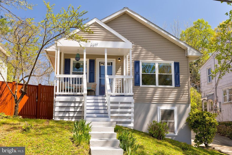 Dreamy, updated bungalow with a fantastic backyard and parking in prime Takoma Park location close to shops and restaurants! Stepping in from the charming front porch you are greeted by the home's sunny and open living space including a custom renovated kitchen that features stainless steel appliances and a butcher-block center island, a dining area with neighborhood views through updated windows, and a lovely living room. Three bedrooms and one full bathroom complete the main level. The updated lower level then offers an additional family room/rec room, a large guest room or media room, a generous entry and mudroom area that steps out to the home's driveway,  the second full bathroom, laundry, and multiple storage closets. Outside you can enjoy the back deck; the large, flat, fenced backyard; the elevated front porch; and parking in the driveway. Thoughtful recent improvements to the house include a new HVAC system in 2023, newer windows at the front of the house, and the fantastic kitchen renovation. And all of this is just minutes to Main Street Takoma with its incredible dining options, shopping, local coffee shops, green spaces, bookstores, and the Takoma Metro! Truly an exceptional location in close-in Takoma Park. Welcome home!