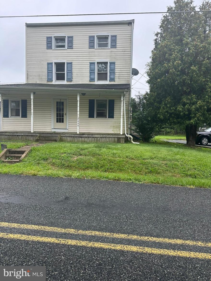 Three-story single-family home in East Greenville, PA. Approximately 2,040 sq ft of finished living space 
above grade, with a full basement (partially finished). Sits on a 1-acre lot. Flooring includes hardwood and 
ceramic tile. Exterior is wood siding with asphalt shingle roof. Features central AC, forced-air natural gas 
heating, and public water and sewer. Cash Only.