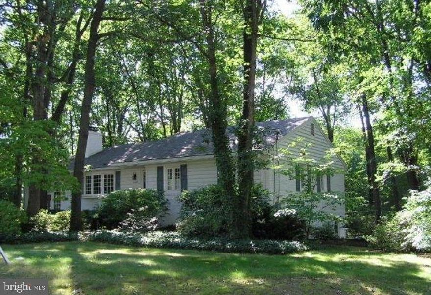 A MUST SEE HOME!! OPEN HOUSE SAT & SUN 1-3
OPEN HOUSE SATURDAY and SUNDAY 1PM - 3PM 
Long-time owner has babied this lovely brick rambler tucked away on near 1/2 acre lot on quiet cul-de-sac surrounded by mature trees*Featuring a beautiful light-filled, expanded kitchen with wall-to-wall windows, built-in seating in the breakfast room with cathedral ceiling, double oven, gas cooktop, cabinets galore, granite counter tops all overlooking  naturally landscaped yard and deck*Formal living room w/mantled gas fireplace, recessed lighting and large picture window overlooking beautifully landscaped front yard*Separate formal dining room with built-ins leads to spacious year-round sunroom with windows galore, volume ceiling and access to the front and back yards*Three nice-sized bedrooms on main level with ensuite primary bedroom*Lovely hardwood floors adorn main level*Lower level boasts expansive rec room with wood-burning fireplace, 4th bedroom/office, full bathroom, laundry room, super-sized storage room and  work/hobby nook*Location, location, location close to  major commuter routes, buses, Pentagon, National Airport, shopping, restaurants, schools and local library