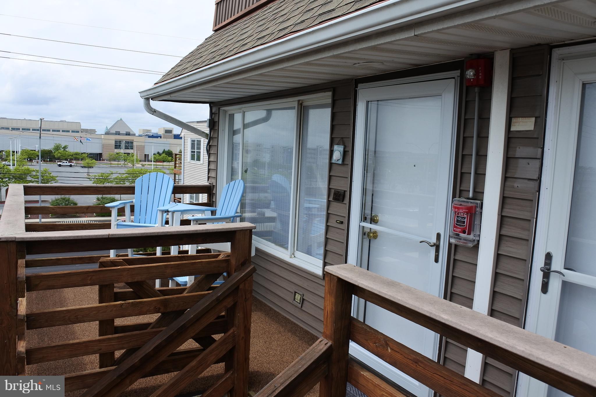 Top Floor End Unit Condo in Ocean Block with south facing sun soaked deck that gives you a great view of the ocean. It is nicely furnished and new carpet throughout. Assigned covered parking space and beach locker coupled with a convenient location across from the Convention Center and walking distance to eating, shopping and the beach. Great summer home or rental!