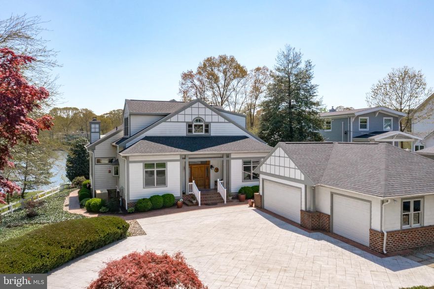 Severna Park waterfront living at its best! Welcome to 363 South Drive. A stunning home on a picturesque .94 acre lot. Deep protected water (6ft MLW), new boat lift, multiple decks overlooking the water and just seconds to the Magothy River. This craftsman style home meets modern design, just over 9ft high ceilings, open floor plan, 3 car detached garage and amazing water views. The open gourmet kitchen has granite countertops, stainless steel appliances , maple hardwood floors and new 36-inch gas range.  The Primary Bedroom is on the MAIN LEVEL and features a recently updated bathroom with his/hers closet and BIG views of the water. The waterfront living room has wood burning fireplace, extensive recessed lighting and hardwood floors. Just off the living room and Primary Bedroom is a beautiful screened in porch that overlooks the water.  The versatile upper level has an oversized bedroom that could be used as a Primary Bedroom and also has great space for an office or study area. The seller has done numerous improvements, new roof, replaced bulkhead, replaced the majority of the boards on the pier, replaced the HVAC for the upper level and added electric service to the pier. Magothy Beach has public water, sewer, Severna Park Blue Ribbon schools and is conveniently located close to Rt 2. Don't miss out on this one!